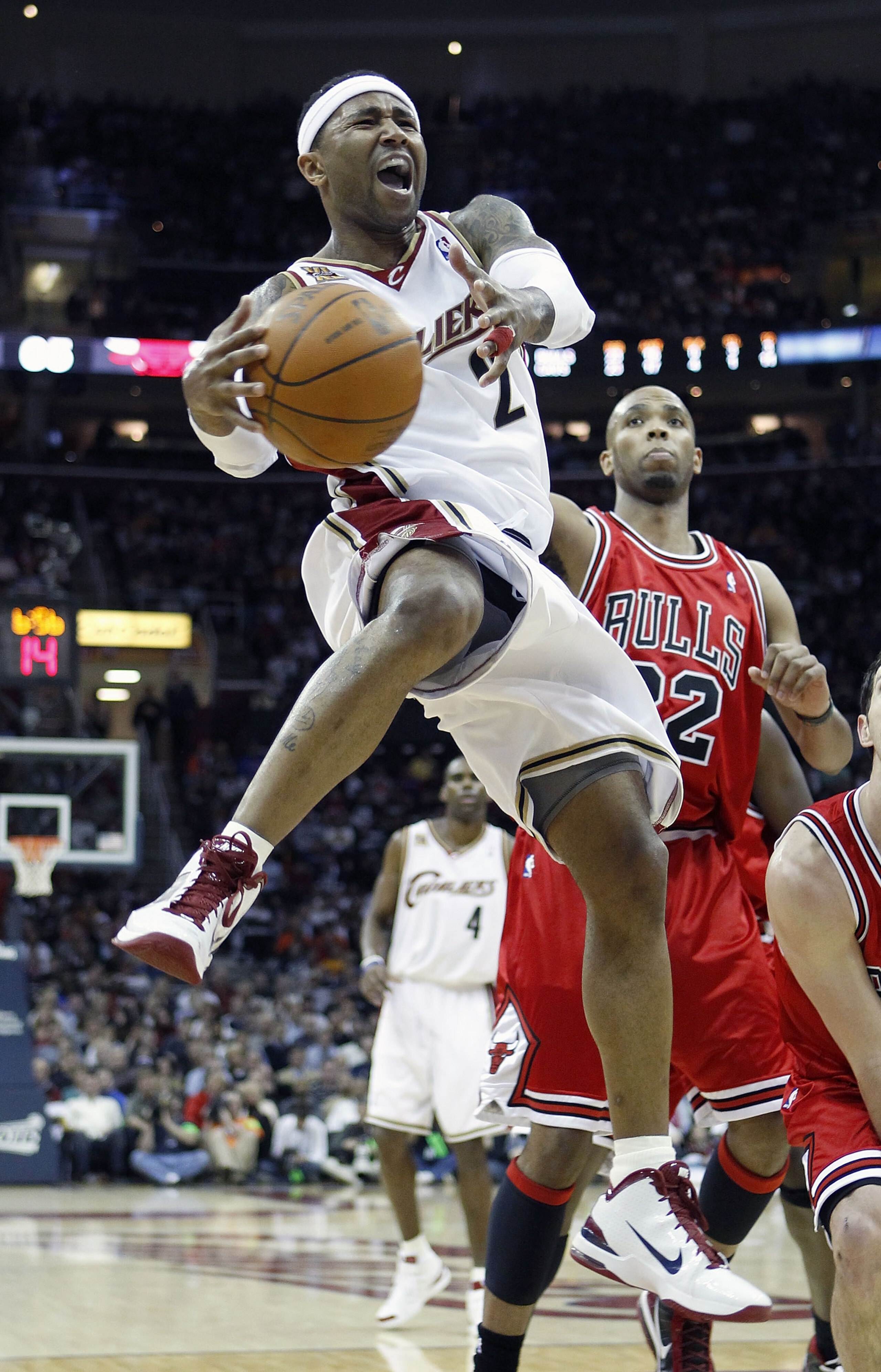 CLEVELAND - APRIL 19: Mo Williams #2 of the Cleveland Cavaliers tries to get a shot off in front of Taj Gibson #22 of the Chicago Bulls in Game Two of the Eastern Conference Quarterfinals during the 2010 NBA Playoffs at Quicken Loans Arena on April 19, 20