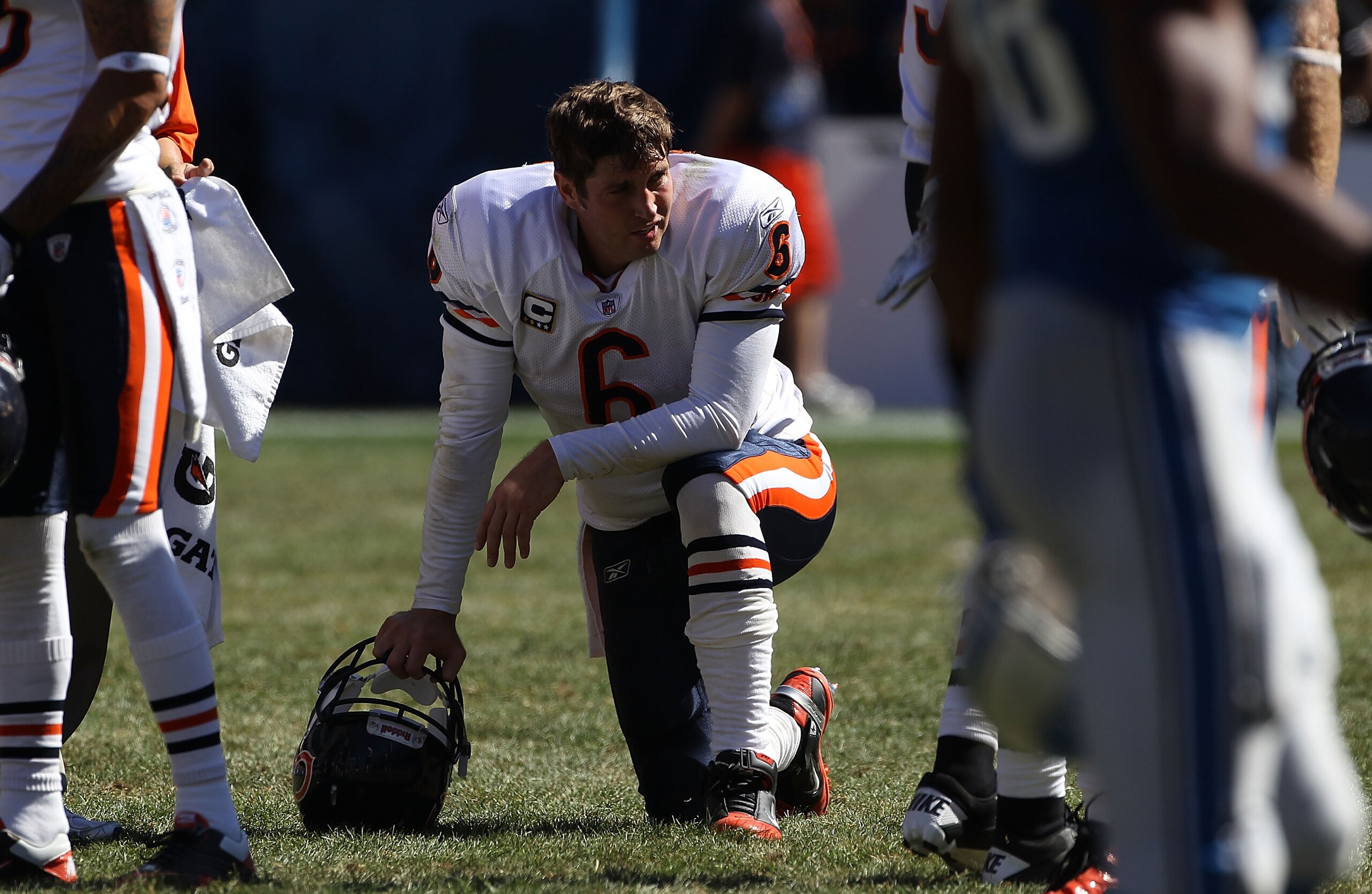 CHICAGO - SEPTEMBER 12: Jay Cutler #6 of the Chicago Bears rests during a time-out against the Detroit Lions during the NFL season opening game at Soldier Field on September 12, 2010 in Chicago, Illinois. The Bears defeated the Lions 19-14. (Photo by Jona