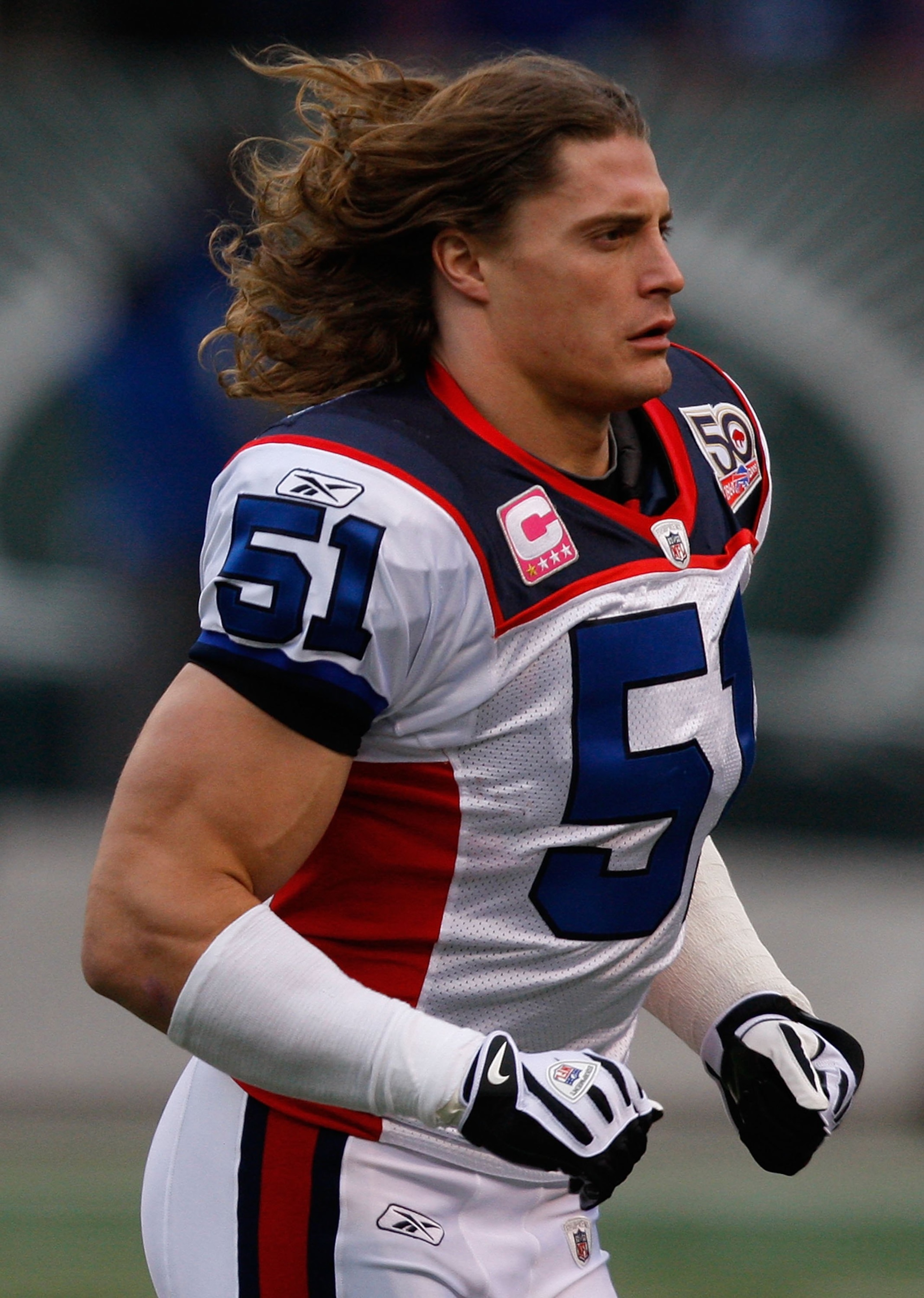 EAST RUTHERFORD, NJ - OCTOBER 18: Paul Posluszny #51 of the Buffalo Bills runs off the field following the coin toss before the game against the New York Jets on October 18, 2009 at Giants Stadium in East Rutherford, New Jersey. The Bills defeated the Jet EAST RUTHERFORD, NJ - OCTOBER 18: Paul Posluszny #51 of the Buffalo Bills runs off the field following the coin toss before the game against the New York Jets on October 18, 2009 at Giants Stadium in East Rutherford, New Jersey. The Bills defeated the Jet