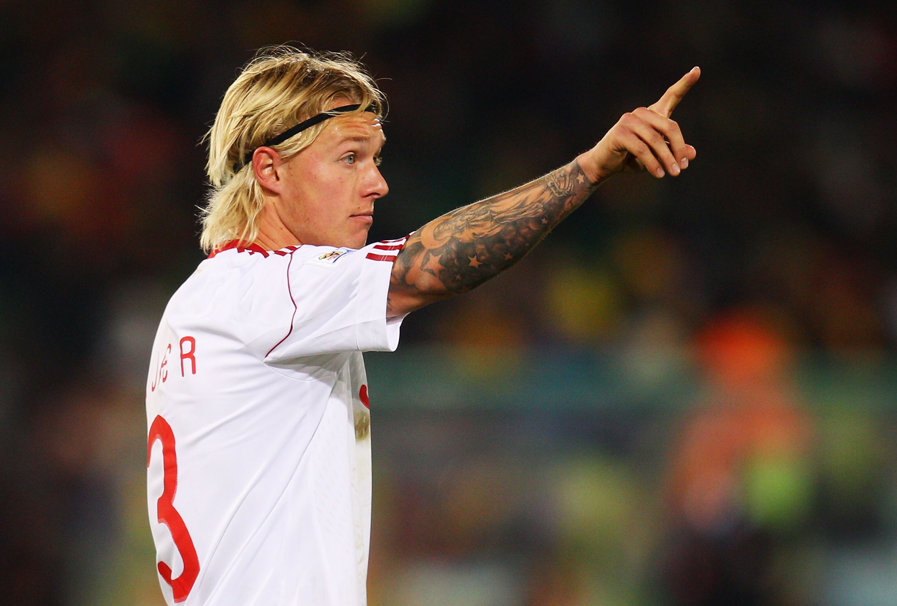 PRETORIA, SOUTH AFRICA - JUNE 19:  Simon Kjaer of Denmark directs his team mates during the 2010 FIFA World Cup South Africa Group E match between Cameroon and Denmark at Loftus Versfeld Stadium on June 19, 2010 in Tshwane/Pretoria, South Africa.  (Photo