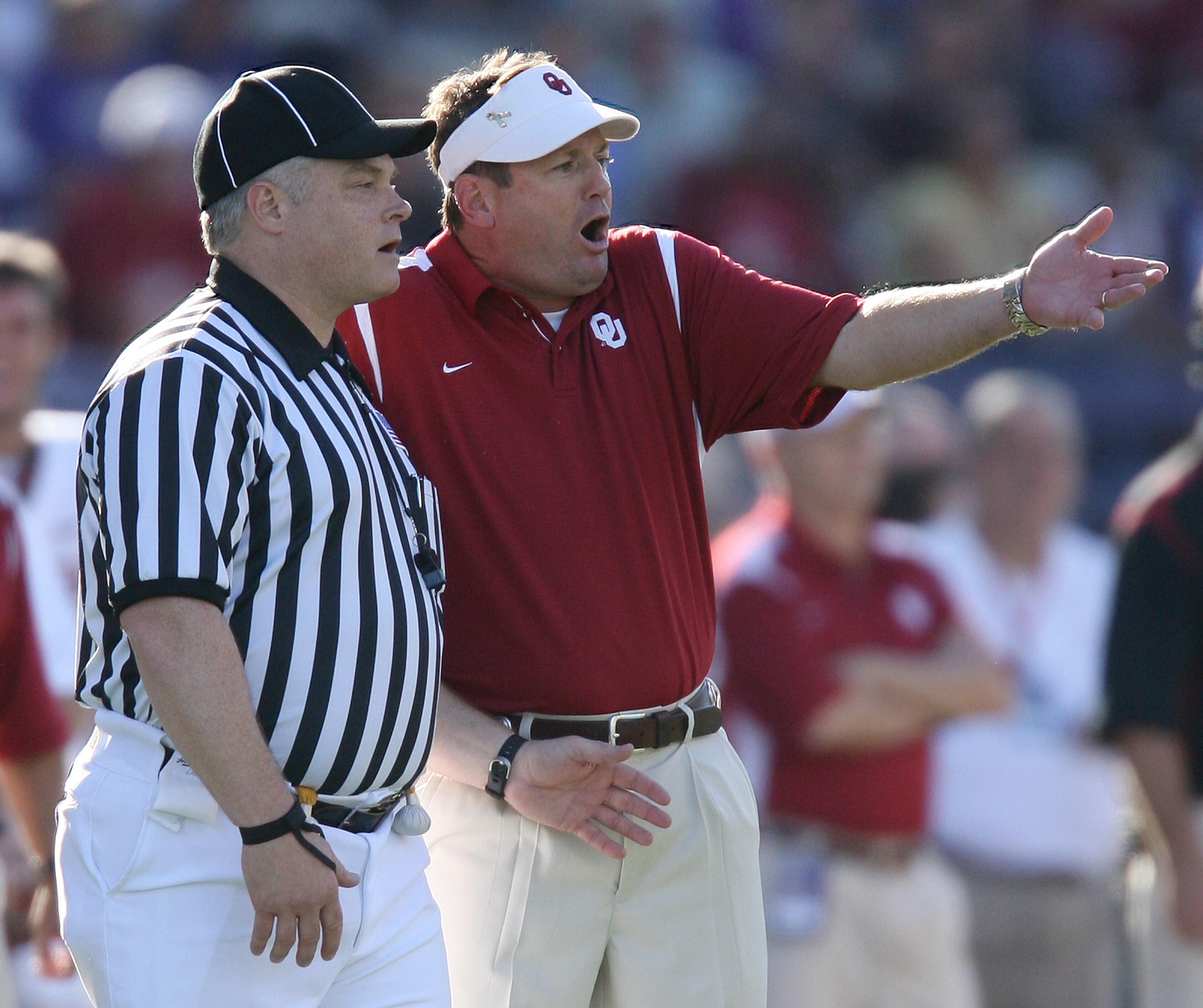 SEATTLE - SEPTEMBER 13: Head coach Bob Stoops of the Oklahoma Sooners questions a late flag call in the first half against the Washington Huskies on September 13, 2008 at Husky Stadium in Seattle Washington. The Sooners defeated the Huskies 55-14. (Photo