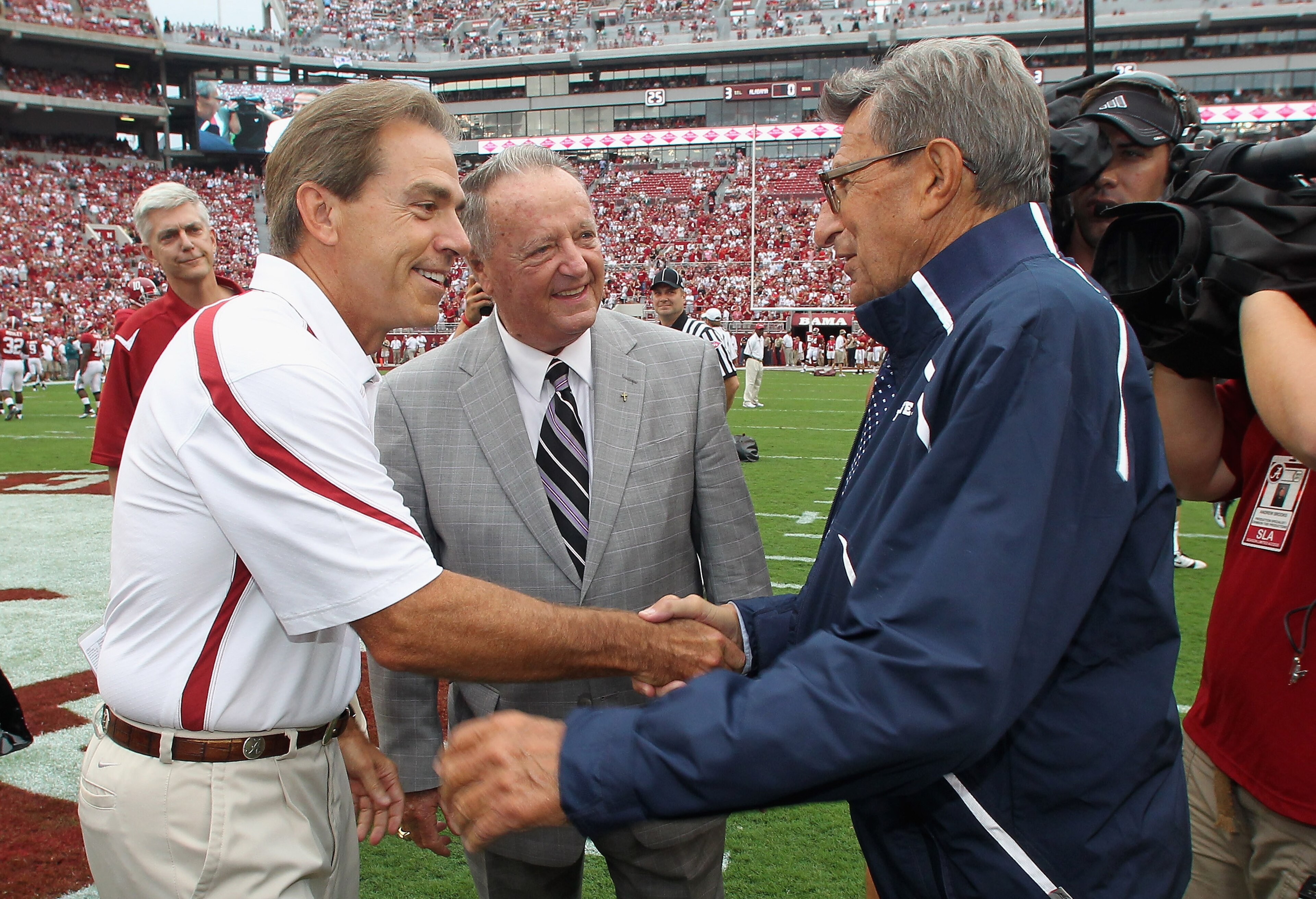 TUSCALOOSA, AL - SEPTEMBER 11:  In this image provided by the University of Alabama, (L-R) head coach Nick Saban of the Alabama Crimson Tide, retired coach Bobby Bowden and head coach Joe Paterno of the Penn State Nittany Lions converse during pre-game wa