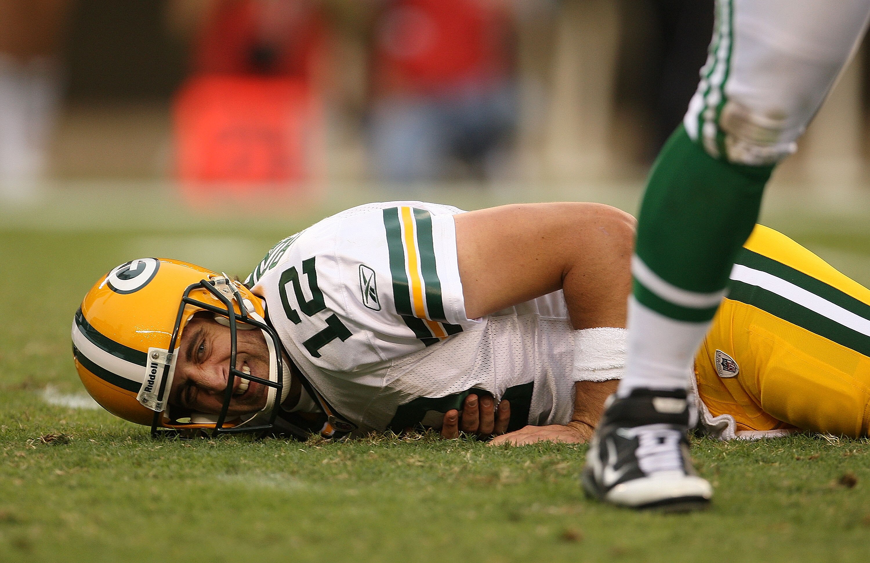PHILADELPHIA - SEPTEMBER 12:  Aaron Rodgers #12 of the Green Bay Packers after being sacked during a game against the Philadelphia Eagles at Lincoln Financial Field on September 12, 2010 in Philadelphia, Pennsylvania.  (Photo by Mike Ehrmann/Getty Images)