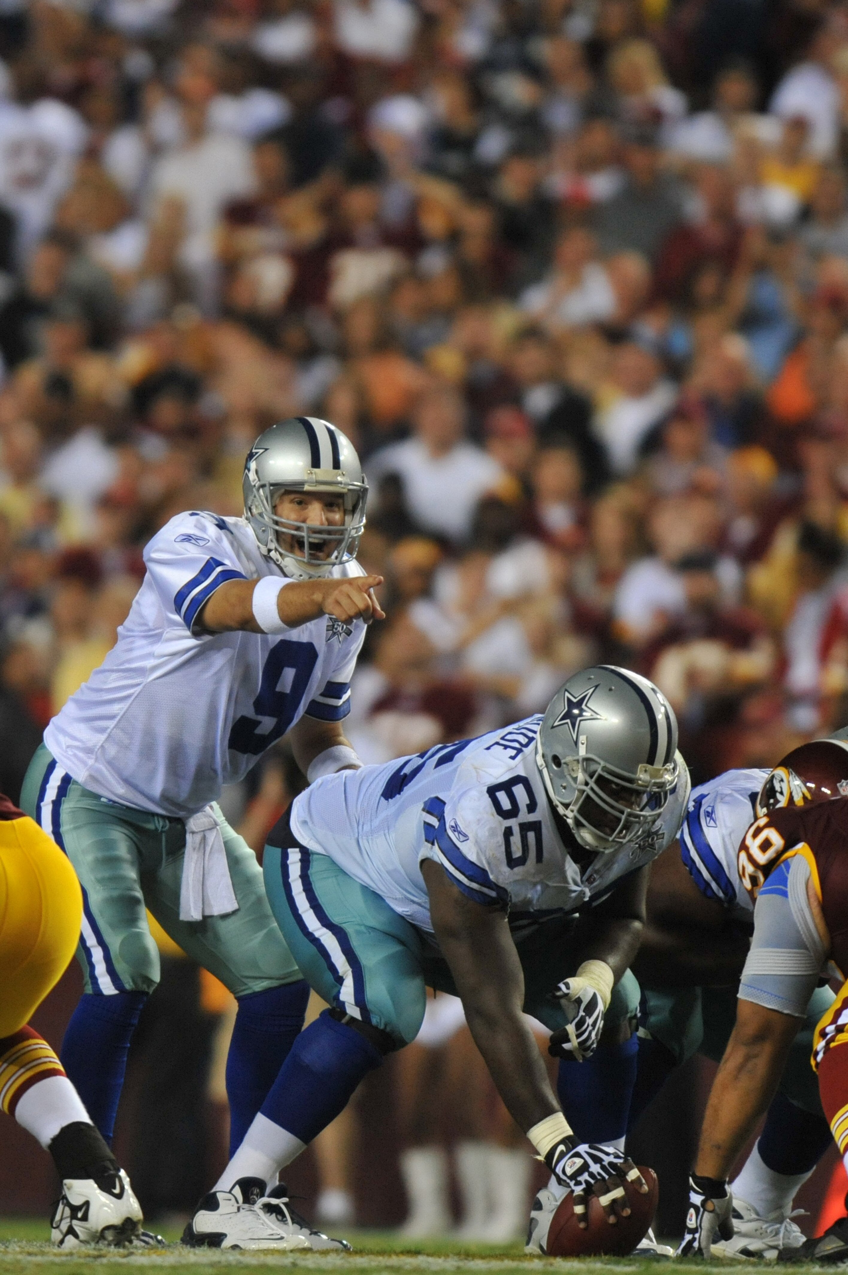 LANDOVER - SEPTEMBER 12:  Tony Romo #9 of the Dallas Cowboys audibles during the NFL season opener against the Washington Redskins at FedExField on September 12, 2010 in Landover, Maryland. The Redskins defeated the Cowboys 13-7. (Photo by Larry French/Ge