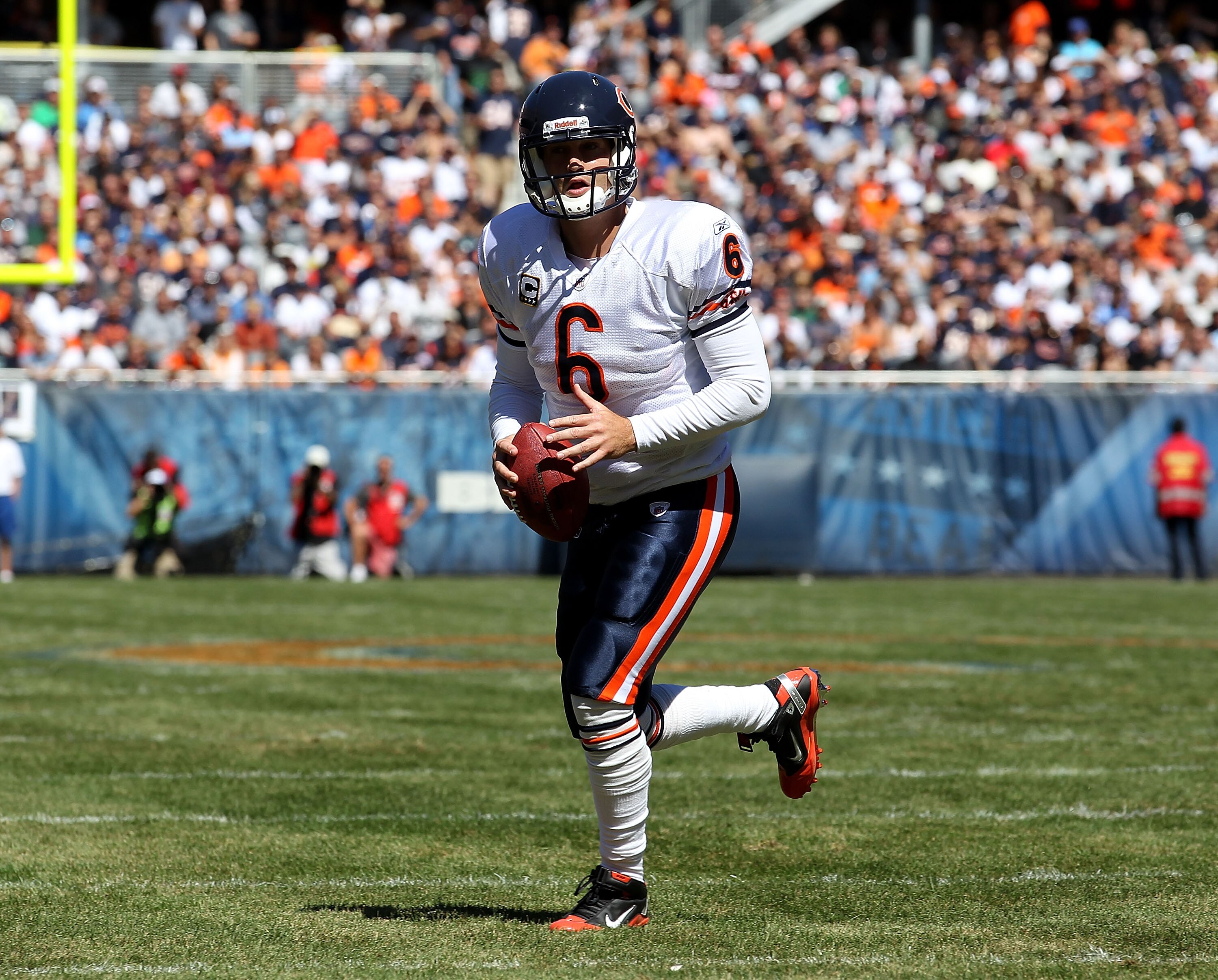 CHICAGO - SEPTEMBER 12: Jay Cutler #6 of the Chicago Bears looks for a receiver against the Detroit Lions during the NFL season opening game at Soldier Field on September 12, 2010 in Chicago, Illinois. The Bears defeated the Lions 19-14. (Photo by Jonatha