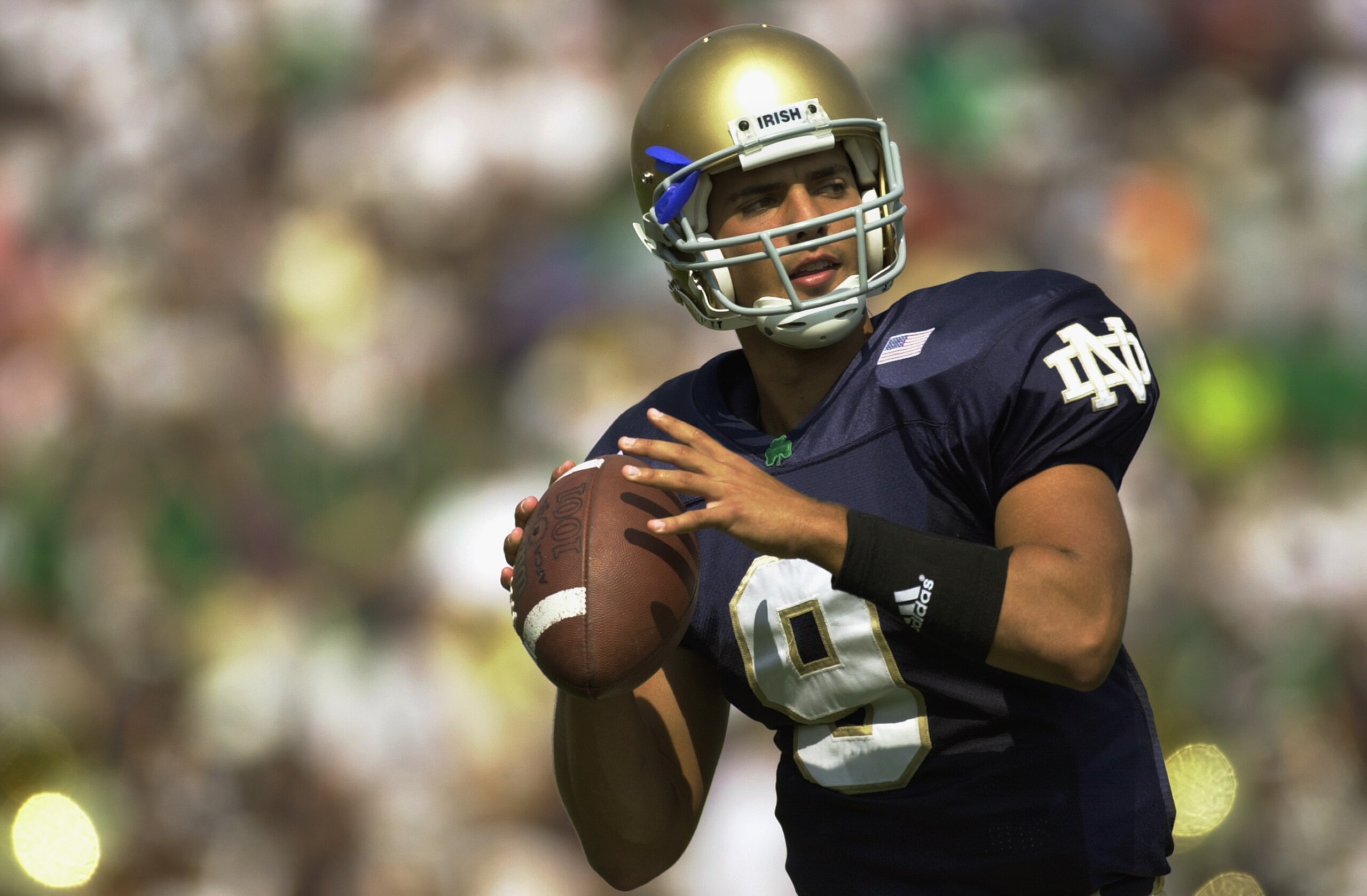 SOUTH BEND, IN - SEPTEMBER 14:  Backup quarterback Pat Dillingham #9 of Notre Dame throws the ball before the NCAA football game against Michigan at Notre Dame Stadium in South Bend, Indiana on September 14, 2002.  The Notre Dame Fighting Irish defeated t