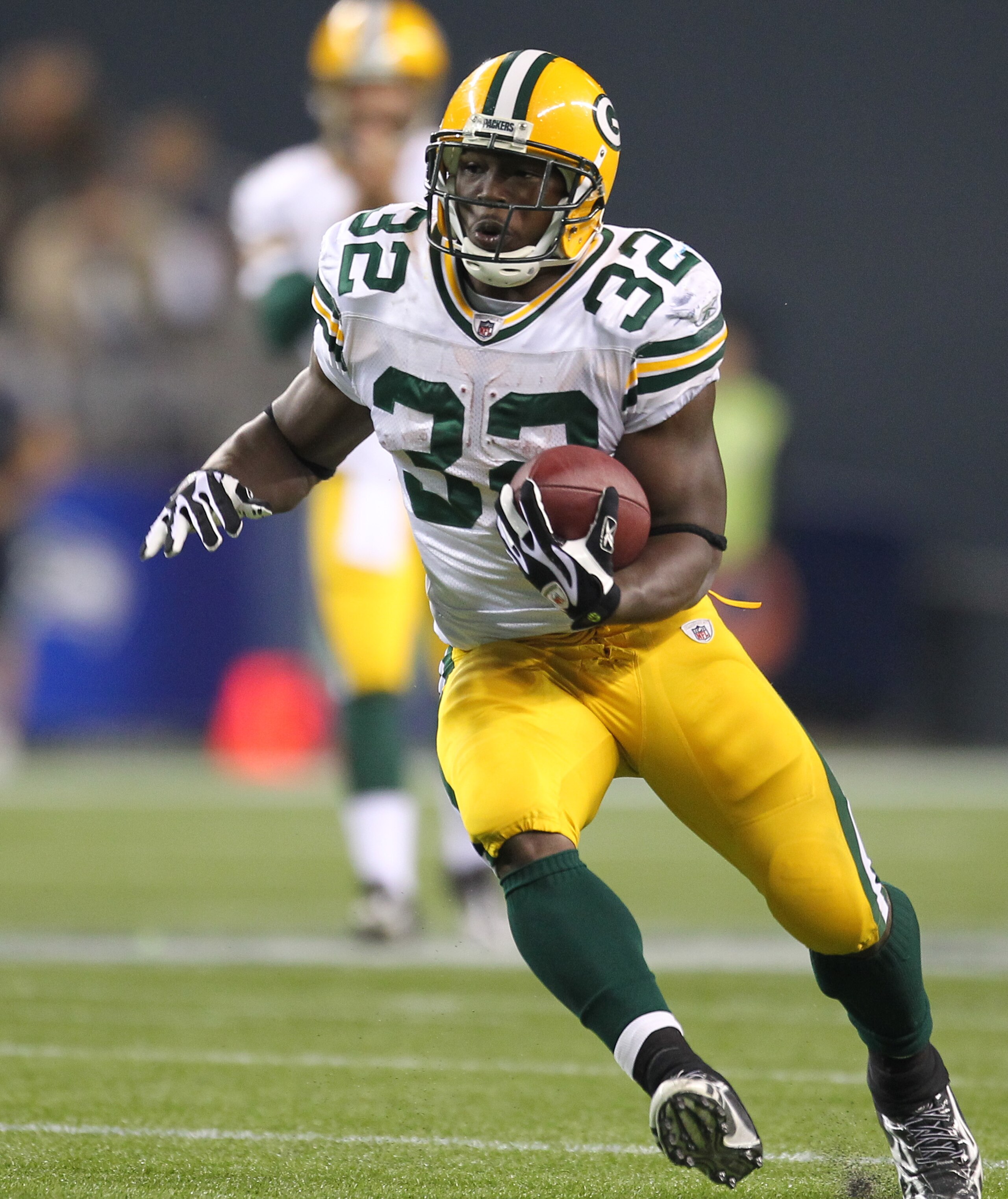 SEATTLE - AUGUST 21:  Running back Brandon Jackson #32 of the Green Bay Packers rushes during the preseason game against the Seattle Seahawks at Qwest Field on August 21, 2010 in Seattle, Washington. (Photo by Otto Greule Jr/Getty Images)
