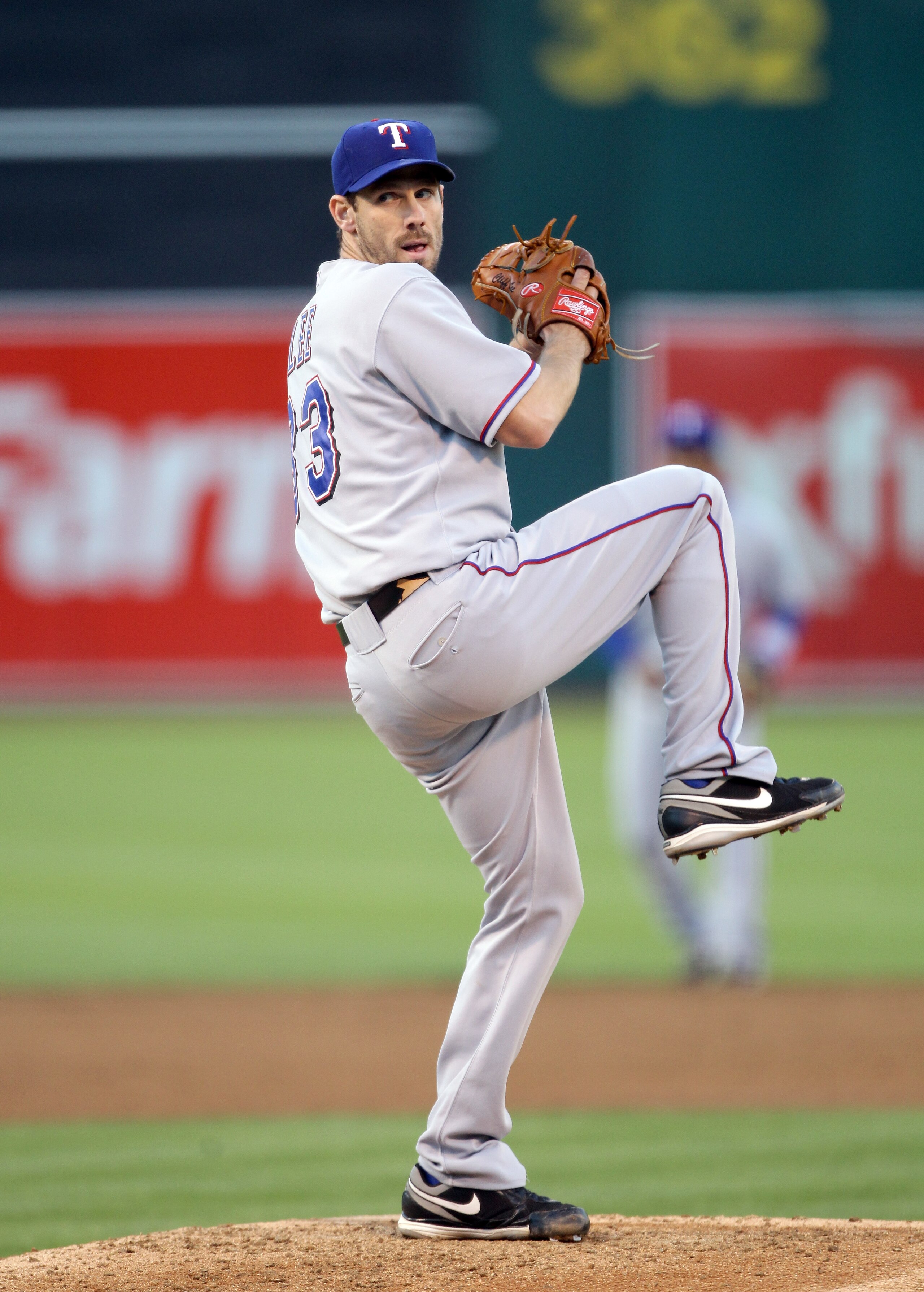 OAKLAND, CA - AUGUST 06:  Cliff Lee #33 of the Texas Rangers pitches against the Oakland Athletics at the Oakland-Alameda County Coliseum on August 6, 2010 in Oakland, California.  (Photo by Ezra Shaw/Getty Images)