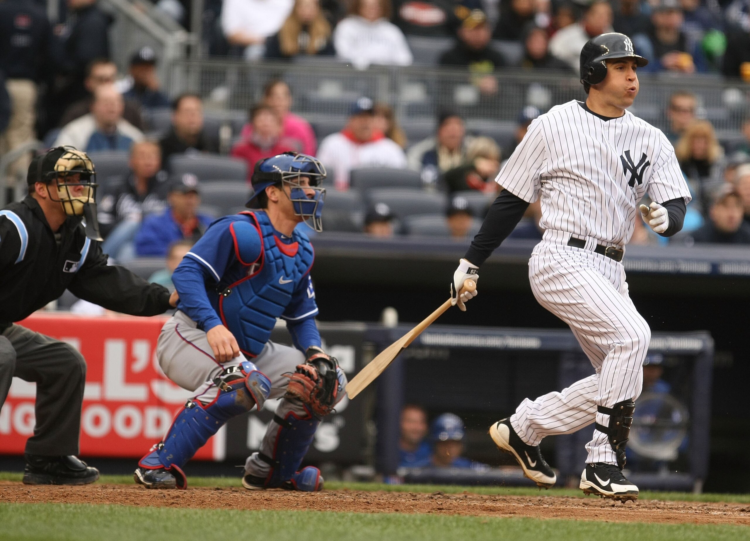 BRONX, NY - APRIL 17:  Mark Teixeira #25 of The New York Yankees drives in a run with a hit against the Texas Rangers during their game on April 17, 2010 at Yankee Stadium in the Bronx Borough of New York.  (Photo by Al Bello/Getty Images)