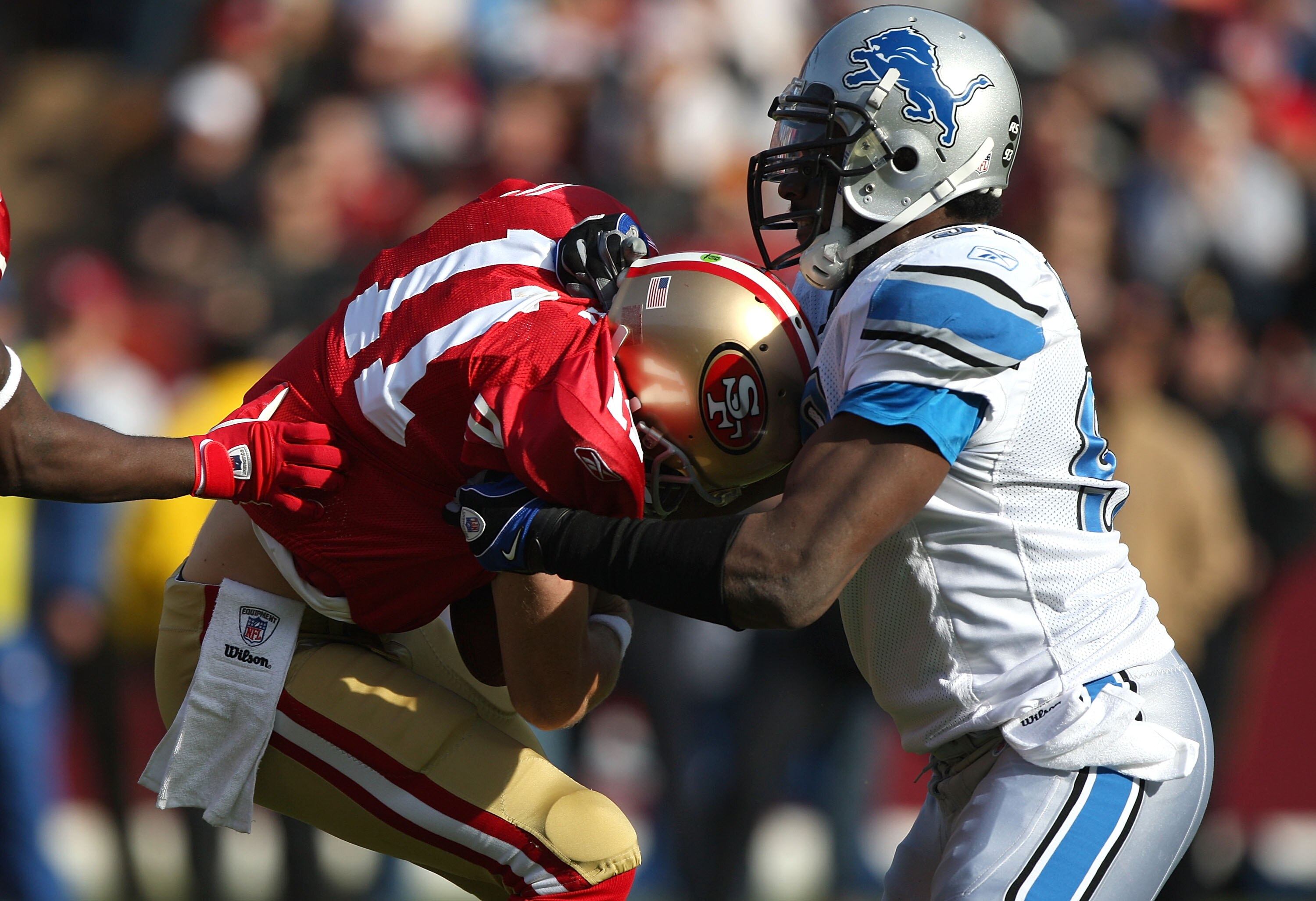 SAN FRANCISCO - DECEMBER 27:  Alex Smith #11 of the San Francisco 49ers is sacked by Jason Hunter #97 of the Detroit Lions during an NFL game at Candlestick Park on December 27, 2009 in San Francisco, California.  (Photo by Jed Jacobsohn/Getty Images)