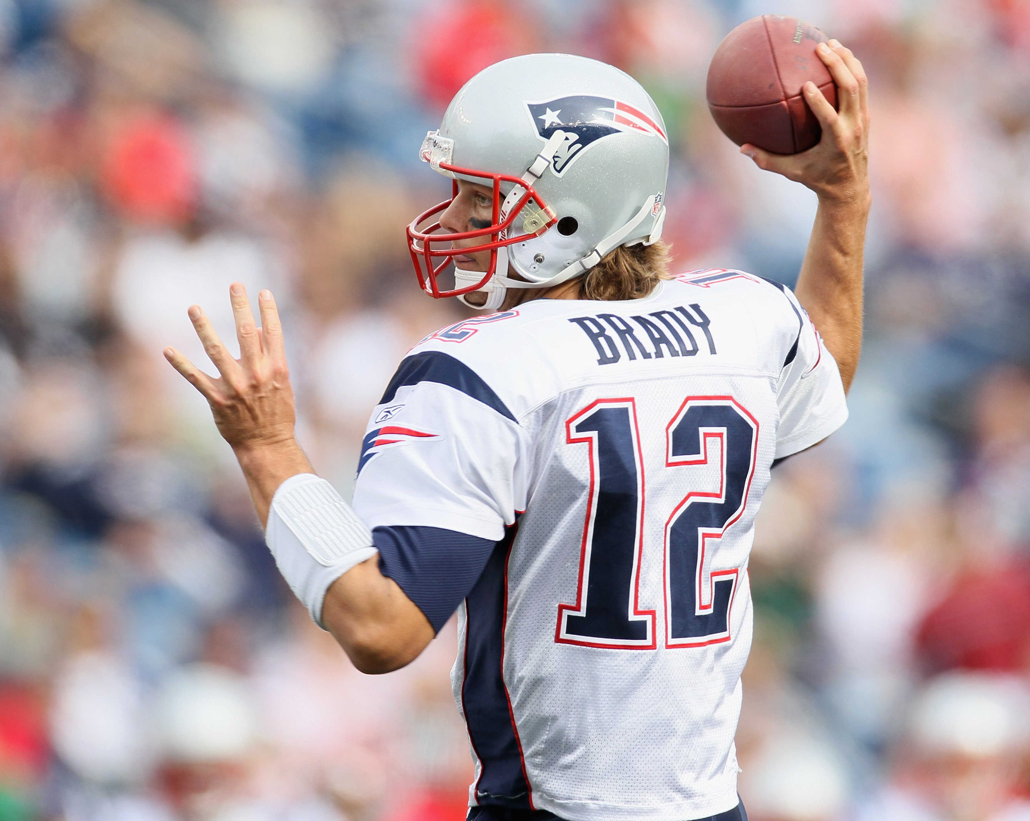 FOXBORO, MA - SEPTEMBER 12:  Tom Brady #12 of the New England Patriots passes the ball in the fourth quarter against the Cincinnati Bengals during the NFL season opener on September 12, 2010 at Gillette Stadium in Foxboro, Massachusetts. The Patriots defe