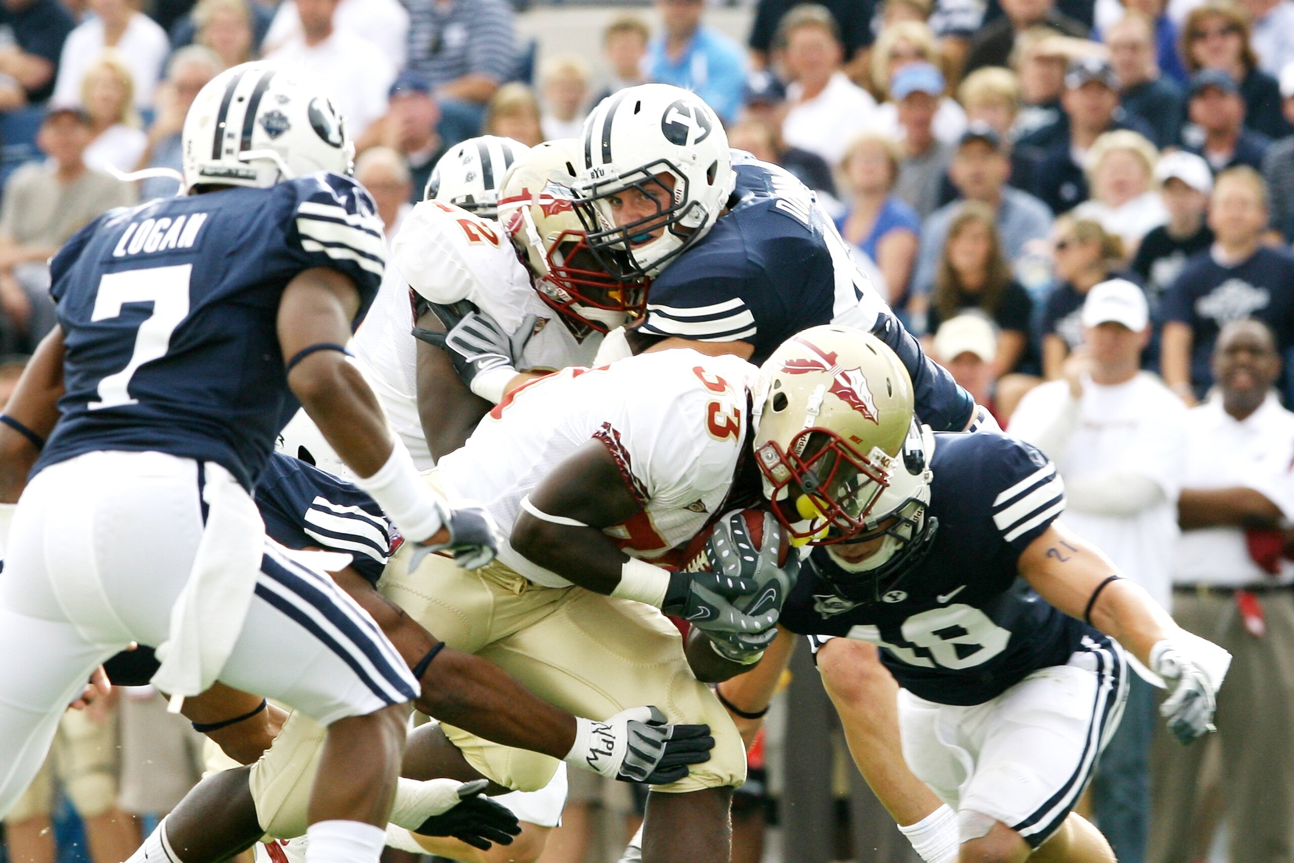 PROVO, UT - SEPTEMBER 19:  Ty Jones #33 of Florida State Seminoles gets tackled by Craig Bills #18 of Brigham Young University Cougars at La Vell Edwards Stadium on September 19, 2009 in Provo, Utah.  (Photo by Melissa Majchrzak via Getty Images)