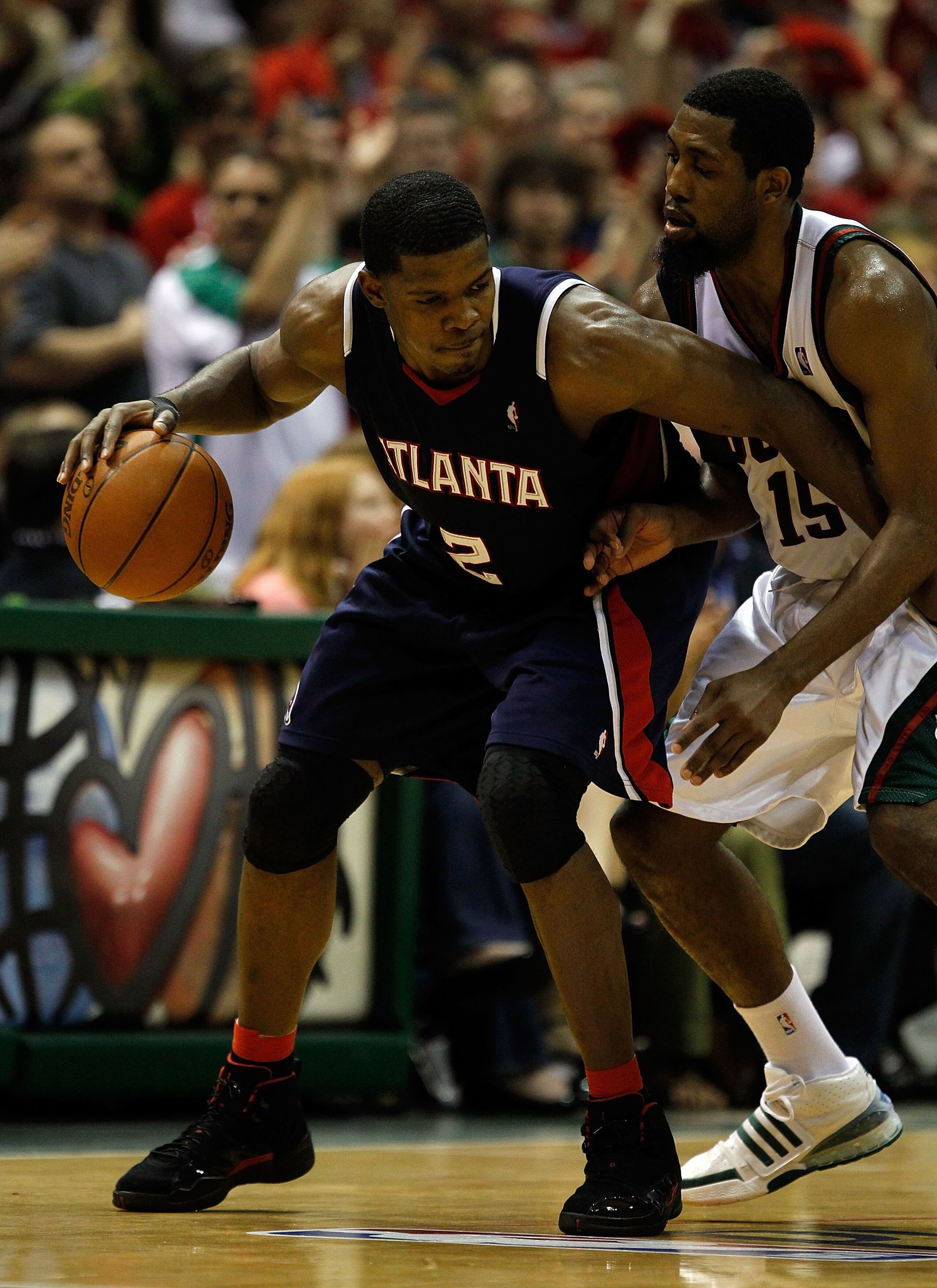 MILWAUKEE - APRIL 30: Joe Johnson #2 of the Atlanta Hawks moves against John Salmons #15 of the Milwaukee Bucks in Game Six of the Eastern Conference Quarterfinals during the 2010 NBA Playoffs at the Bradley Center on April 30, 2010 in Milwaukee, Wisconsi