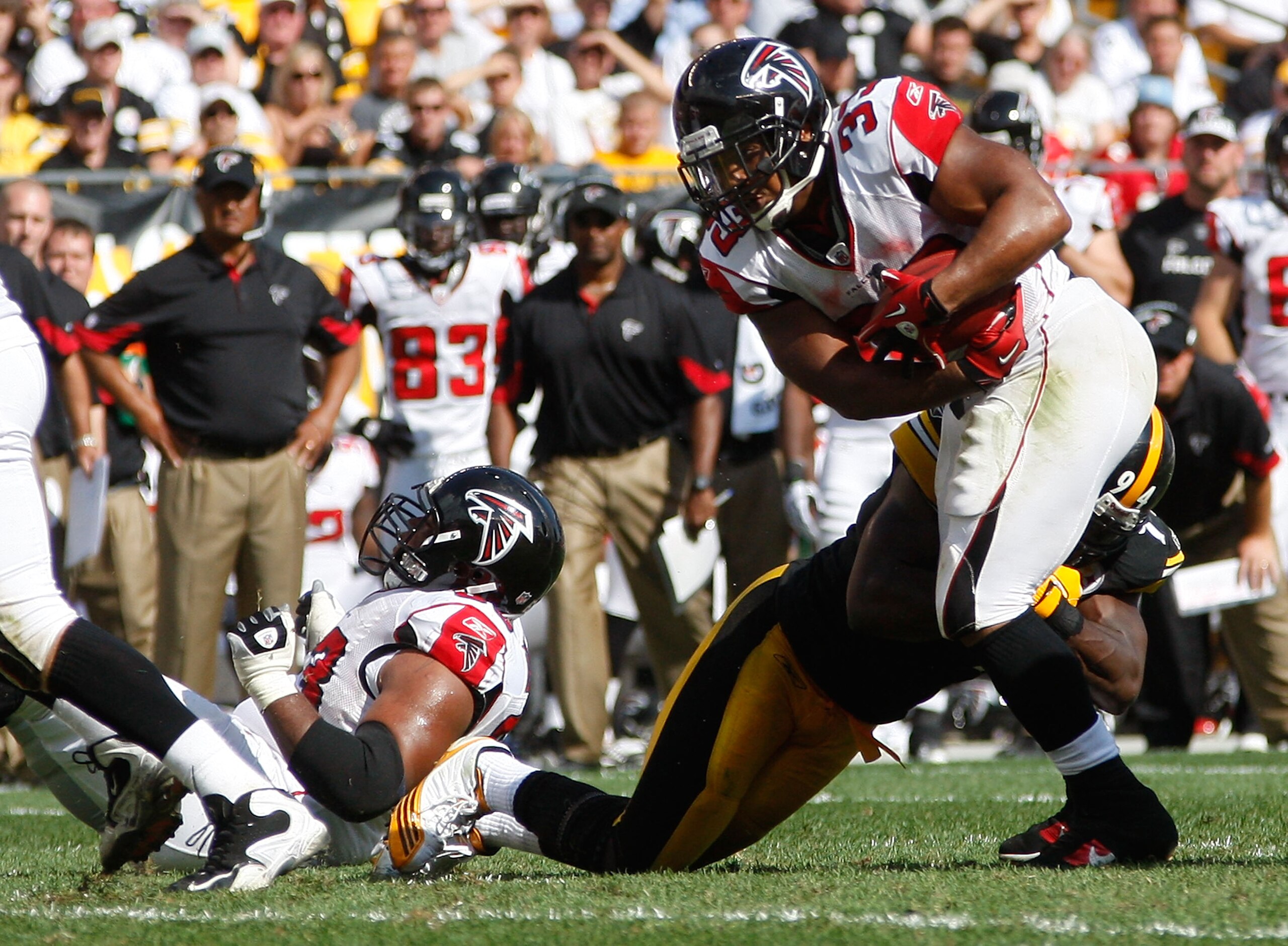 PITTSBURGH - SEPTEMBER 12: Michael Turner #33 of the Atlanta Falcons attempts to run through Lawrence Timmons #94 of the Pittsburgh Steelers during the NFL season opener game on September 12, 2010 at Heinz Field in Pittsburgh, Pennsylvania. (Photo by Ja PITTSBURGH - SEPTEMBER 12: Michael Turner #33 of the Atlanta Falcons attempts to run through Lawrence Timmons #94 of the Pittsburgh Steelers during the NFL season opener game on September 12, 2010 at Heinz Field in Pittsburgh, Pennsylvania. (Photo by Ja