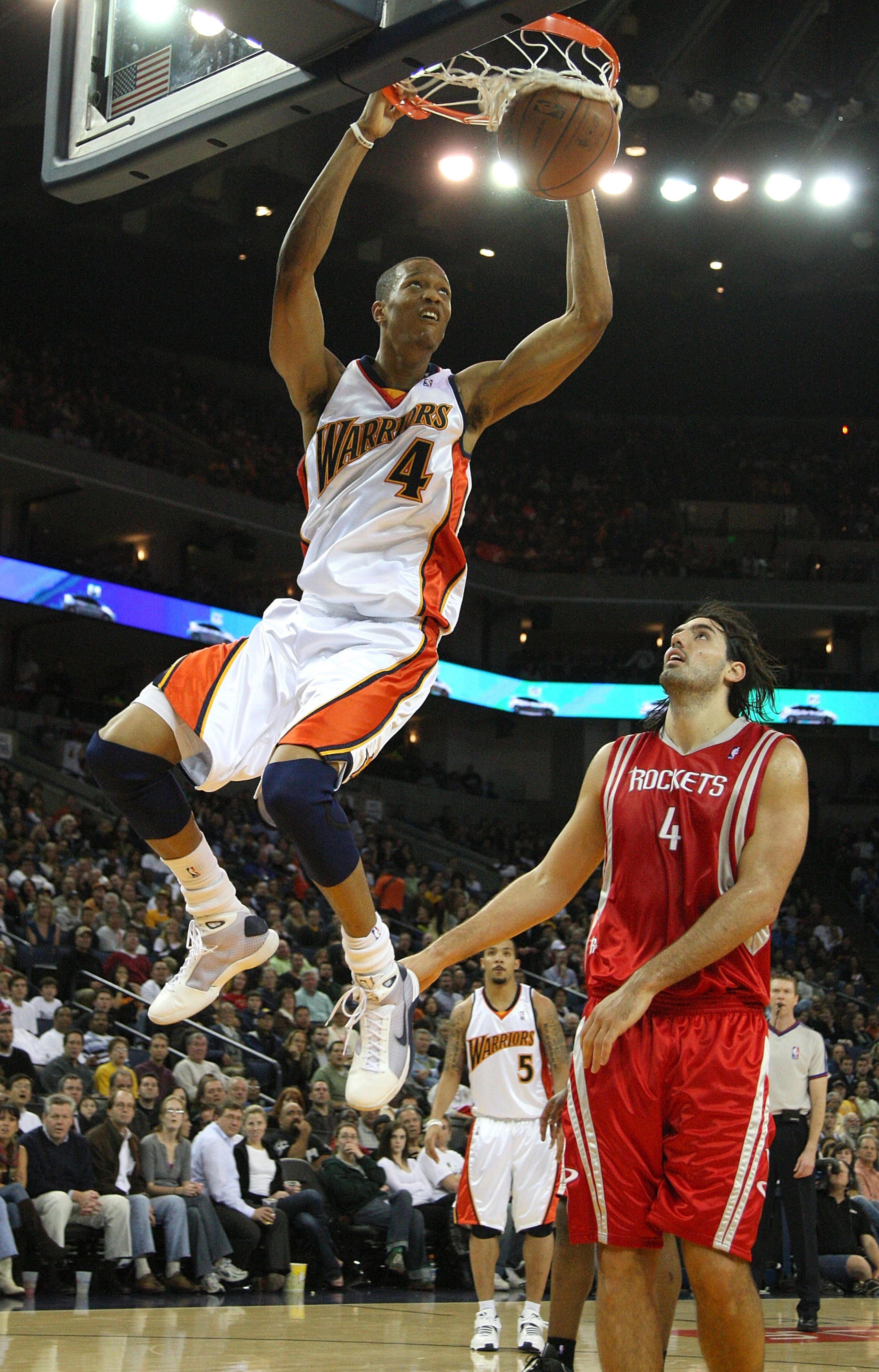 OAKLAND, CA - DECEMBER 12:  Anthony Randolph #4 of the Golden State Warriors shoots over Luis Scola #4 of the Houston Rockets during an NBA game on December 12, 2008 at Oracle Arena in Oakland, California. NOTE TO USER: User expressly acknowledges and agr