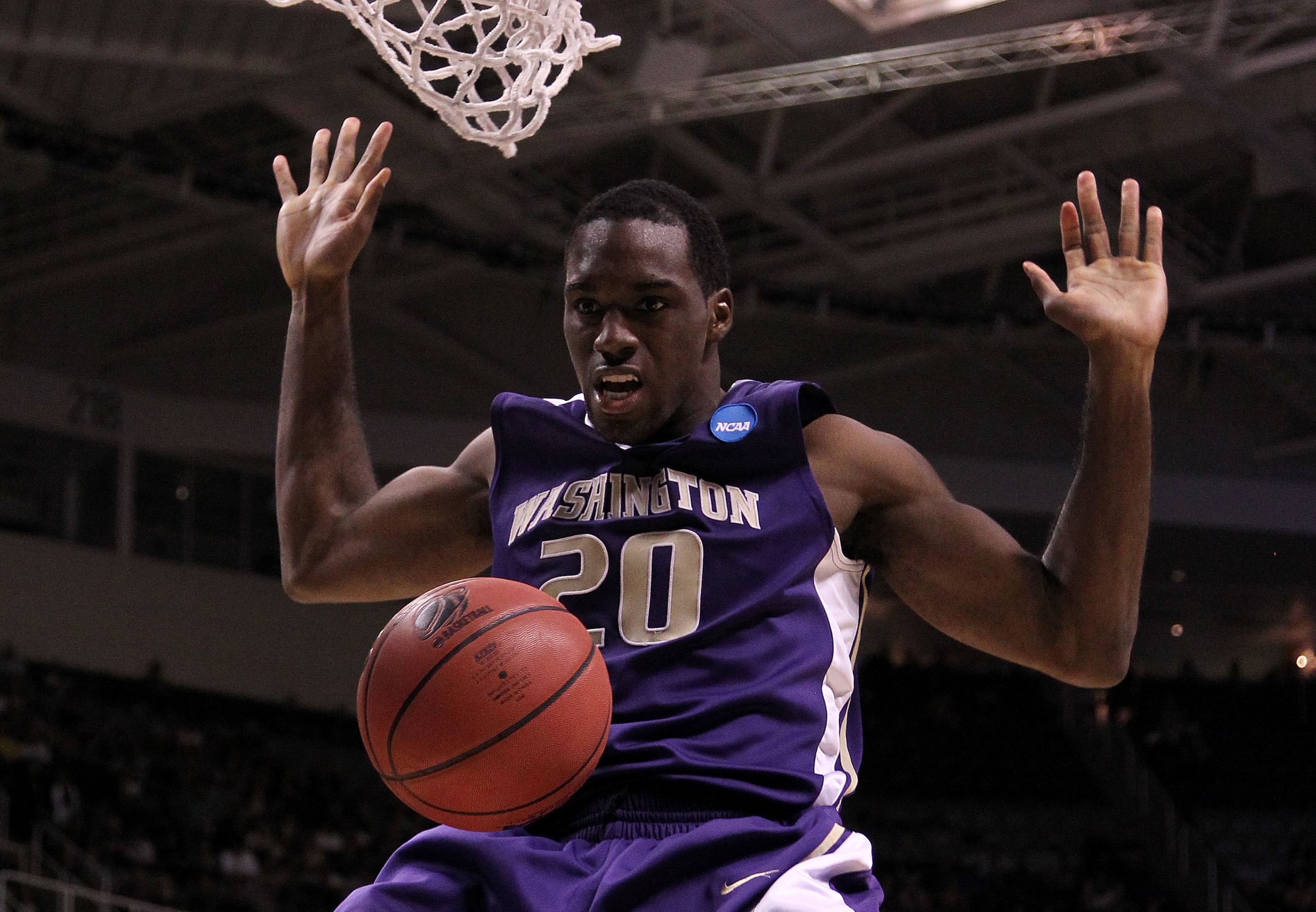 SAN JOSE, CA - MARCH 20:  Forward Quincy Pondexter #20 of the Washington Huskies dunks the ball against the New Mexico Lobos during the second round of the 2010 NCAA men's basketball tournament at HP Pavilion on March 20, 2010 in San Jose, California.  (P