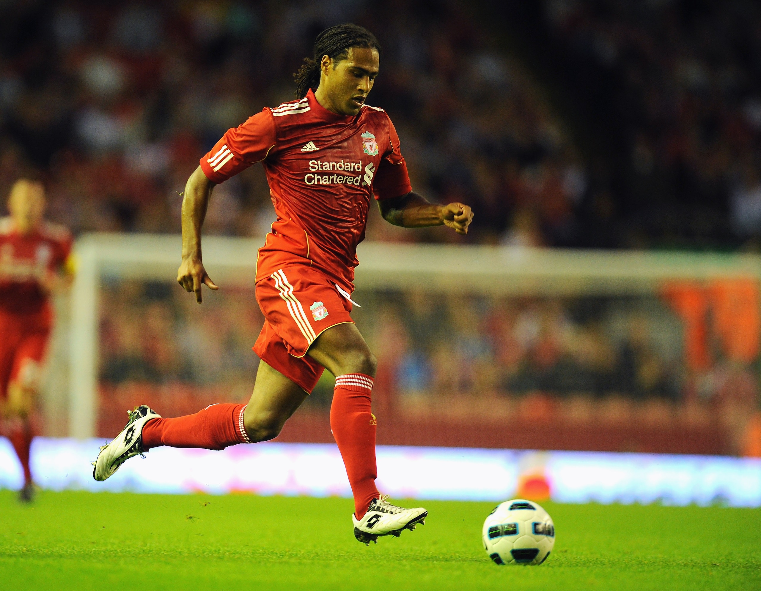 LIVERPOOL, ENGLAND - AUGUST 05: Glen Johnson of Liverpool in action during the Europa League, Third Qualifying Round, Second Leg match between Liverpool and FK Rabotnicki at Anfield on August 5, 2010 in Liverpool, England. (Photo by Clive Mason/Getty Im LIVERPOOL, ENGLAND - AUGUST 05: Glen Johnson of Liverpool in action during the Europa League, Third Qualifying Round, Second Leg match between Liverpool and FK Rabotnicki at Anfield on August 5, 2010 in Liverpool, England. (Photo by Clive Mason/Getty Im