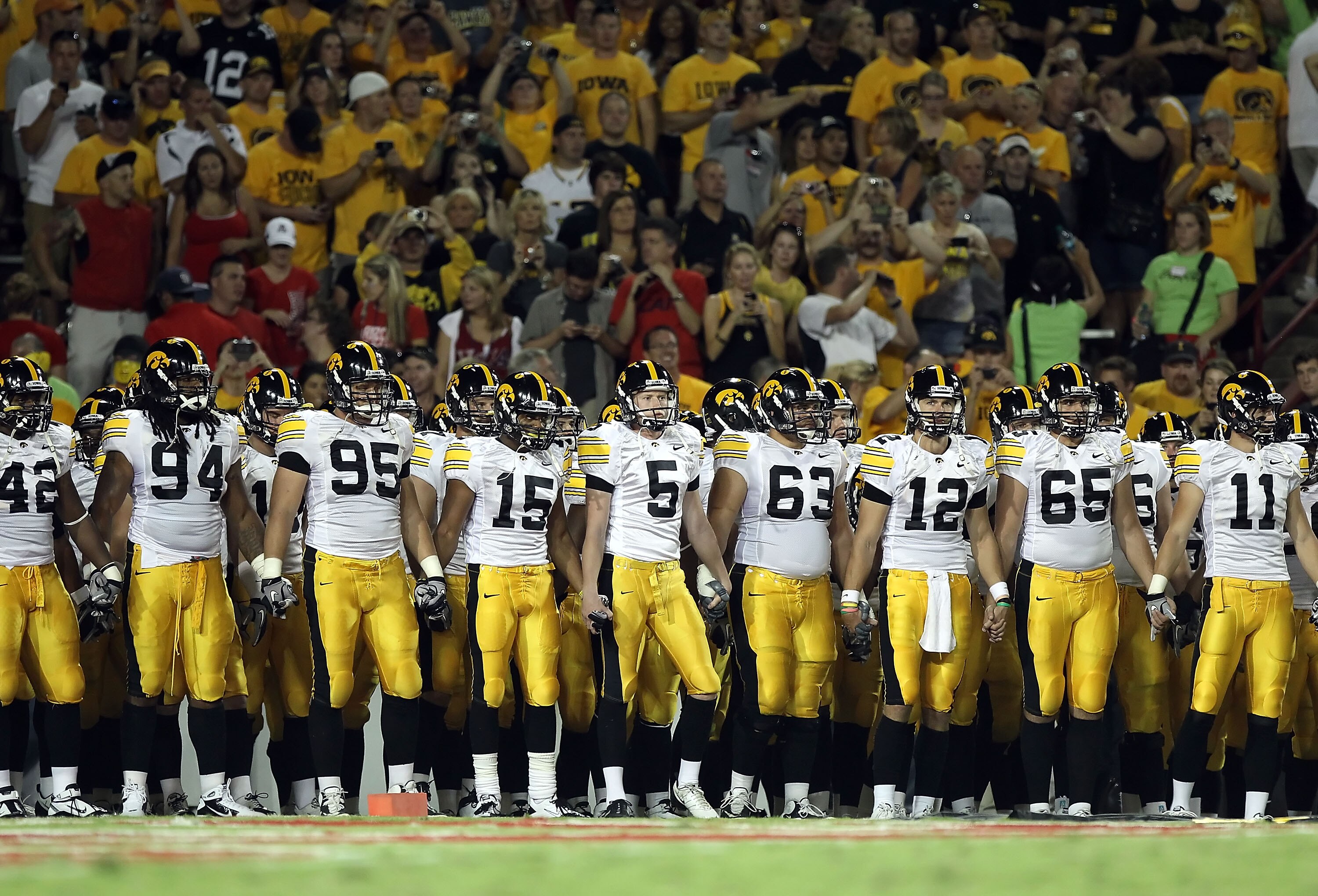 TUCSON, AZ - SEPTEMBER 18:  The Iowa Hawkeyes line up before the college football game against the Arizona Wildcats at Arizona Stadium on September 18, 2010 in Tucson, Arizona. The Wildcats defeated the Hawkeyes 34-27. (Photo by Christian Petersen/Getty I