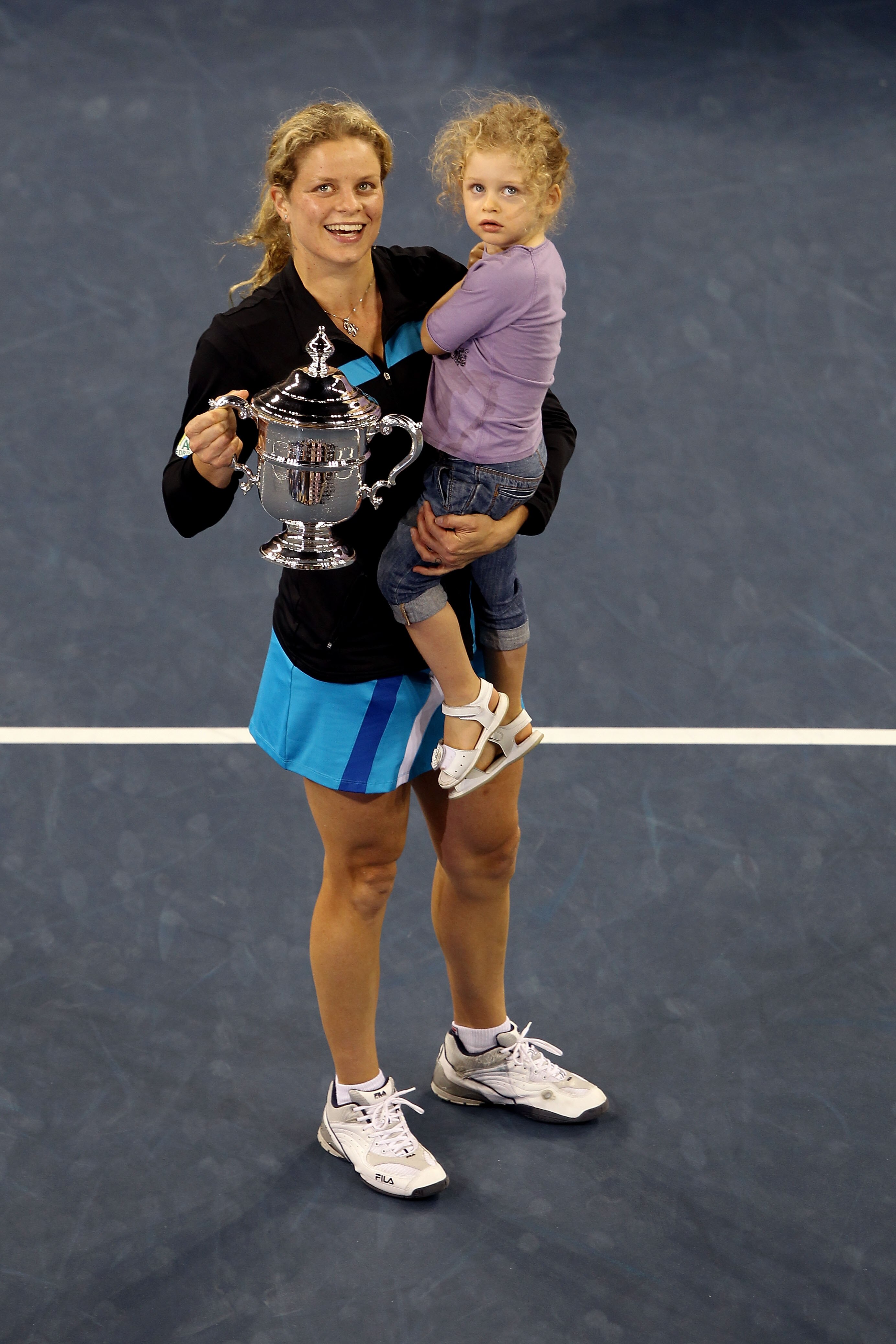 NEW YORK - SEPTEMBER 11:  Kim Clijsters of Belgium and daughter Jada pose with the championship trophy after Clijsters defeated Vera Zvonareva of Russia during their women's singles final on day thirteen of the 2010 U.S. Open at the USTA Billie Jean King