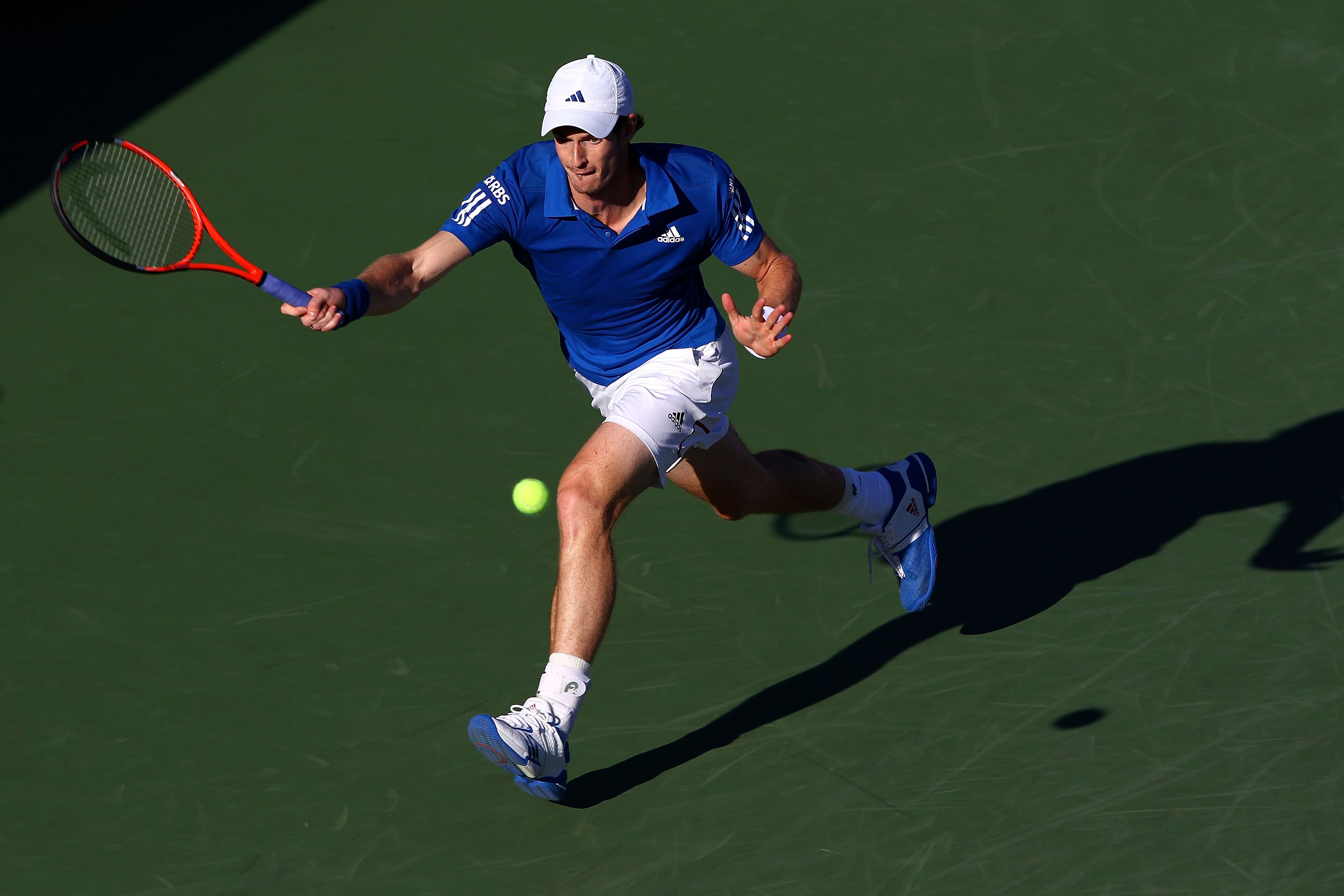 NEW YORK - SEPTEMBER 05:  Andy Murray of Great Britain returns a shot against Stanislas Wawrinka of Switzerland during the men's singles match on day seven of the 2010 U.S. Open at the USTA Billie Jean King National Tennis Center on September 5, 2010 in t
