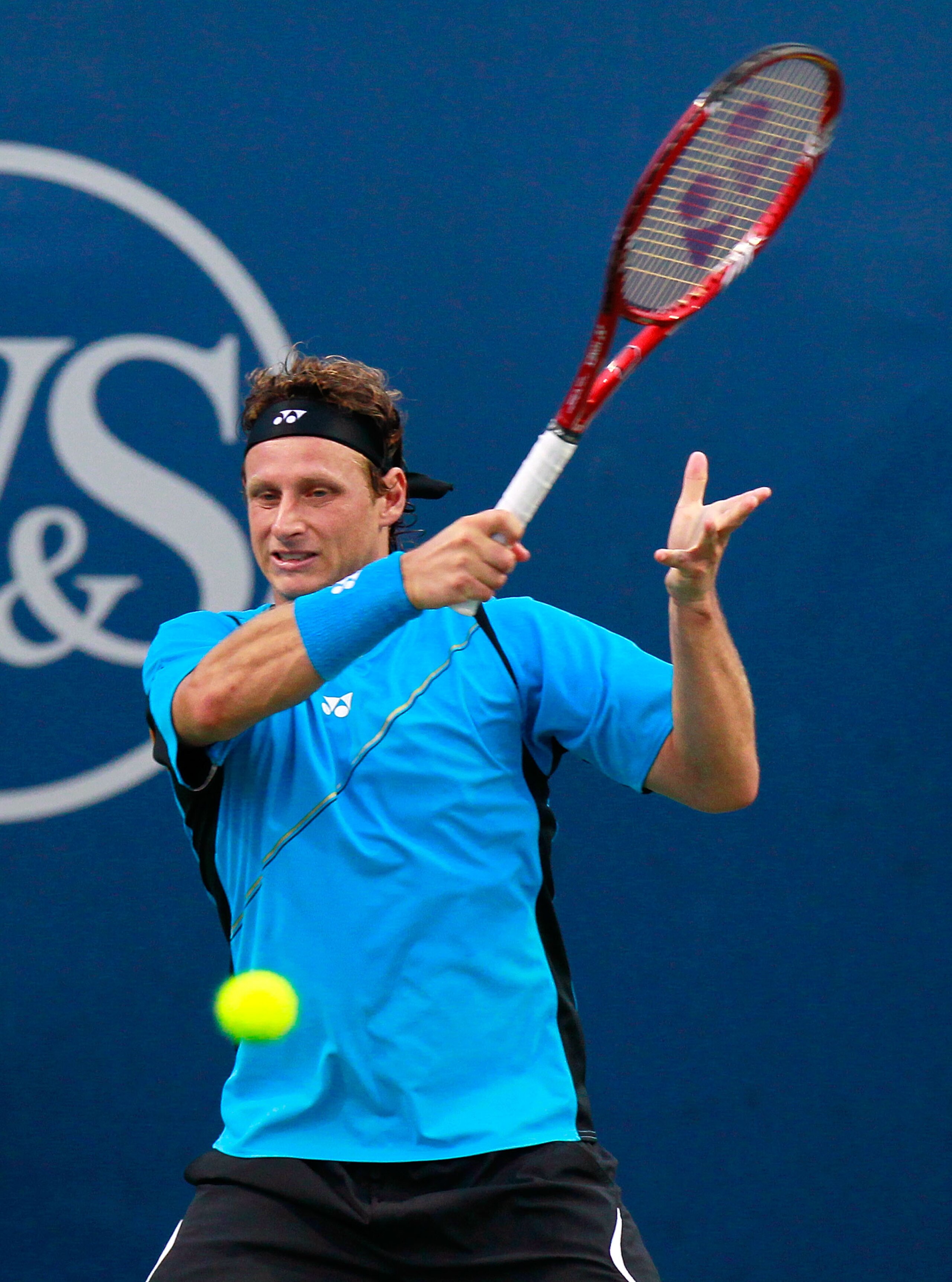 CINCINNATI - AUGUST 17:  David Nalbandian of Argentina returns a forehand to Ivan Ljubicic of Croatia during Day 2 of the Western & Southern Financial Group Masters at the Lindner Family Tennis Center on August 17, 2010 in Cincinnati, Ohio.  (Photo by Kev