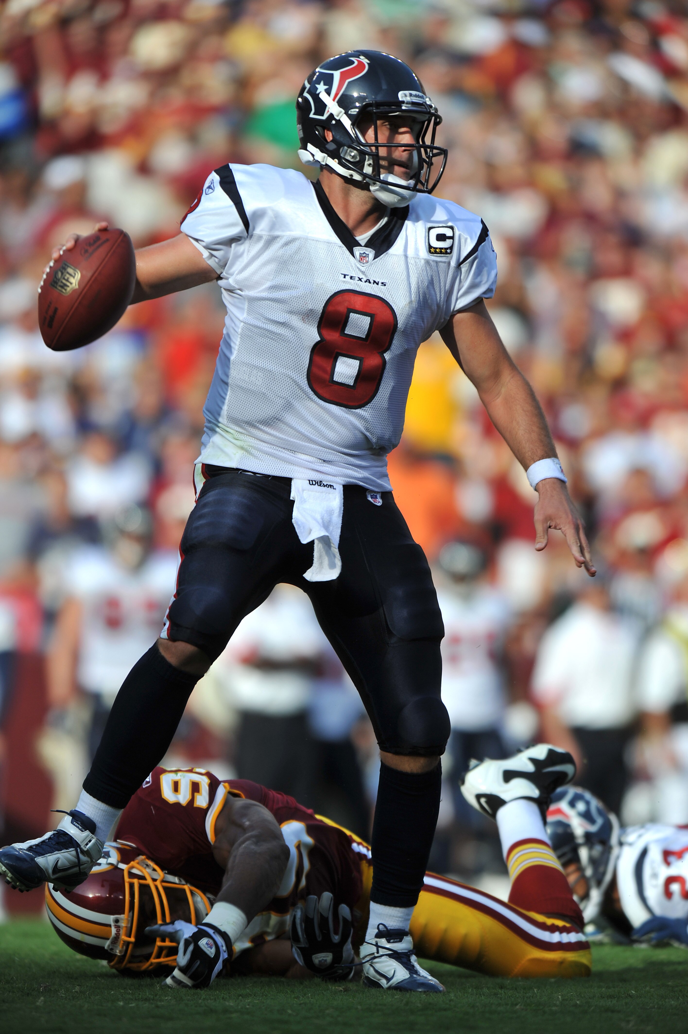 LANDOVER - SEPTEMBER 19:  Matt Schaub #8 of the Houston Texans looks for a receiver during the game against the Washington Redskins at FedExField on September 19, 2010 in Landover, Maryland. The Texans defeated the Redskins 30-27 in overtime. (Photo by La