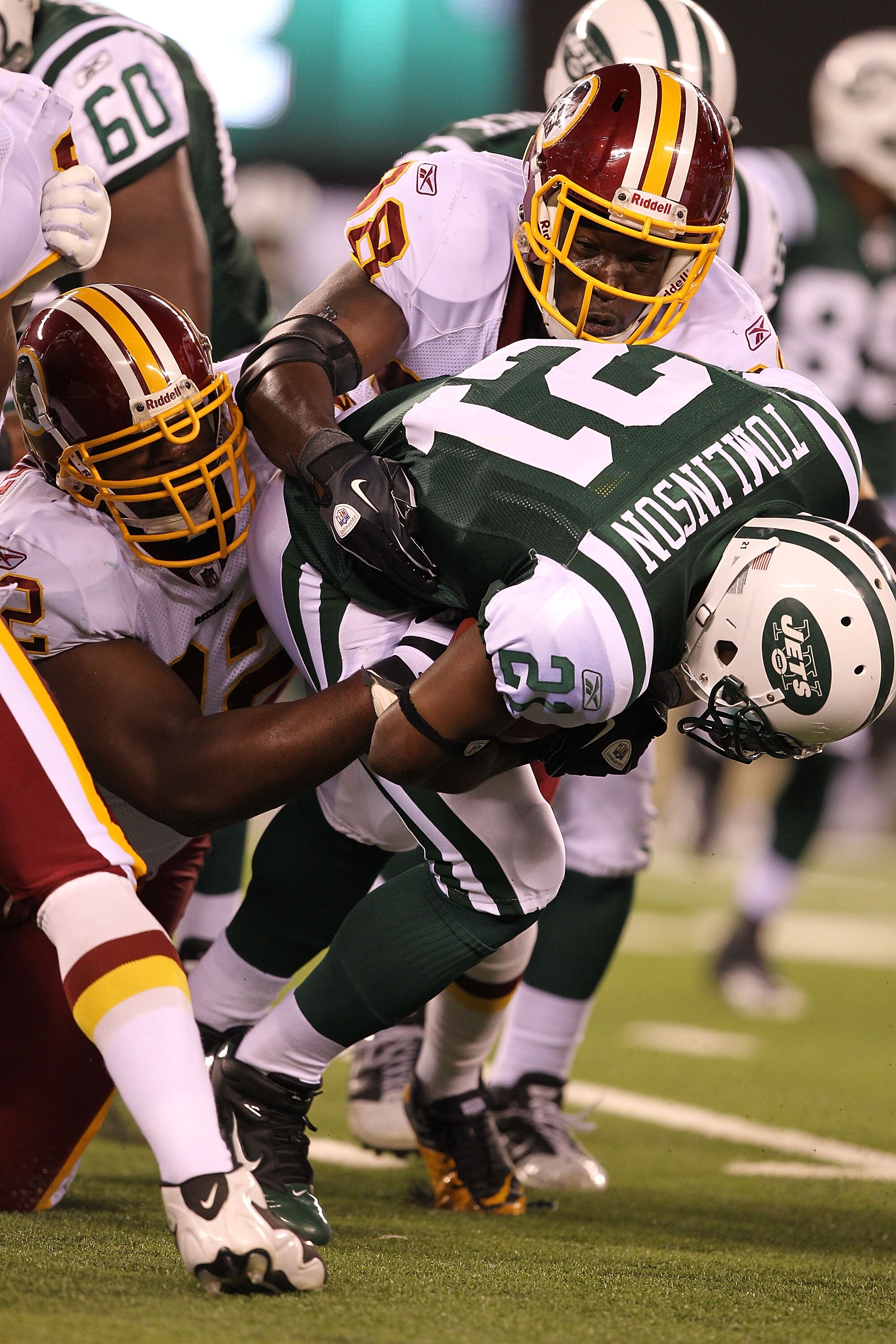 EAST RUTHERFORD, NJ - AUGUST 27:  LaDainian Tomlinson #21 of the New York Jets in action against the Washington Redskins  during their preseason game on August 27, 2010 at the New Meadowlands Stadium  in East Rutherford, New Jersey.  (Photo by Al Bello/Ge