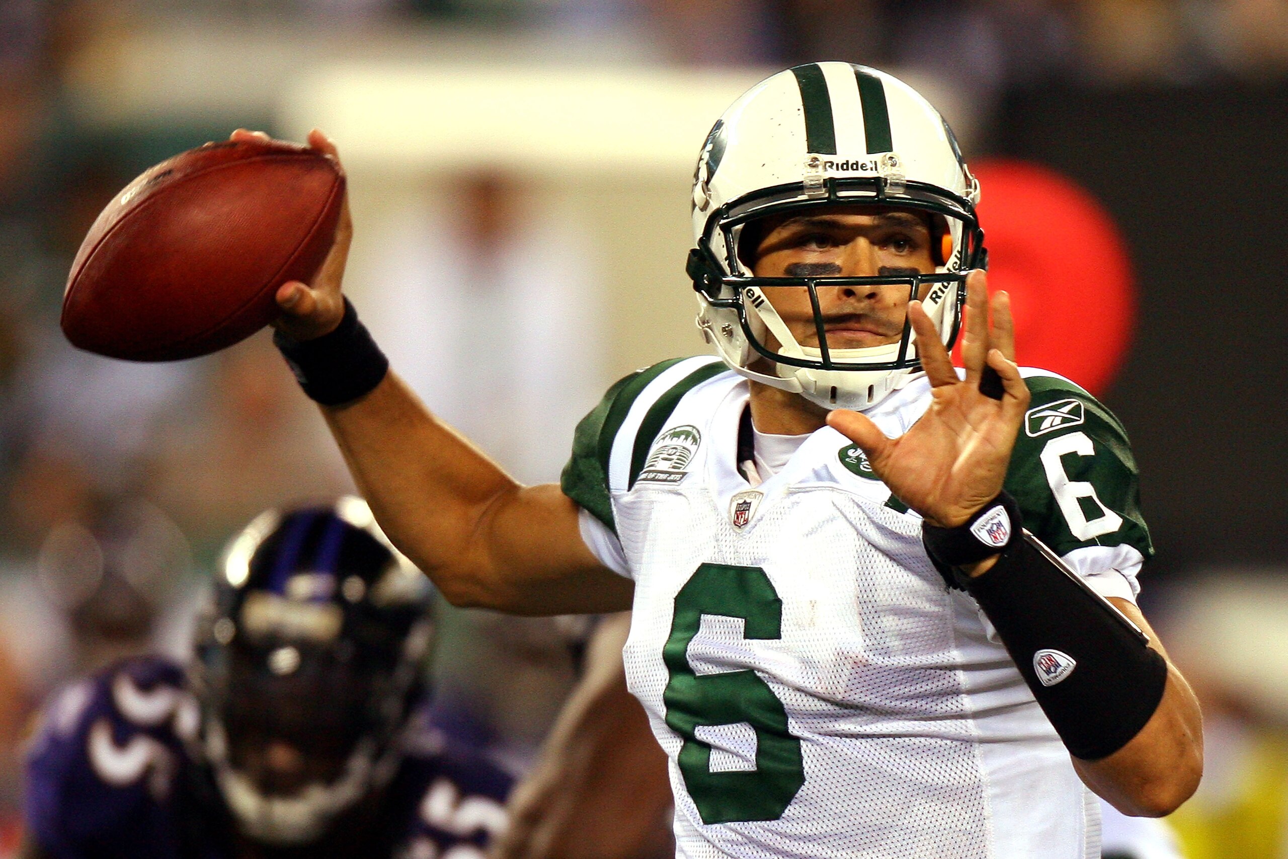 EAST RUTHERFORD, NJ - SEPTEMBER 13:  Mark Sanchez #6 of the New York Jets throws a pass against the Baltimore Ravens during their home opener at the New Meadowlands Stadium on September 13, 2010 in East Rutherford, New Jersey.  (Photo by Andrew Burton/Get