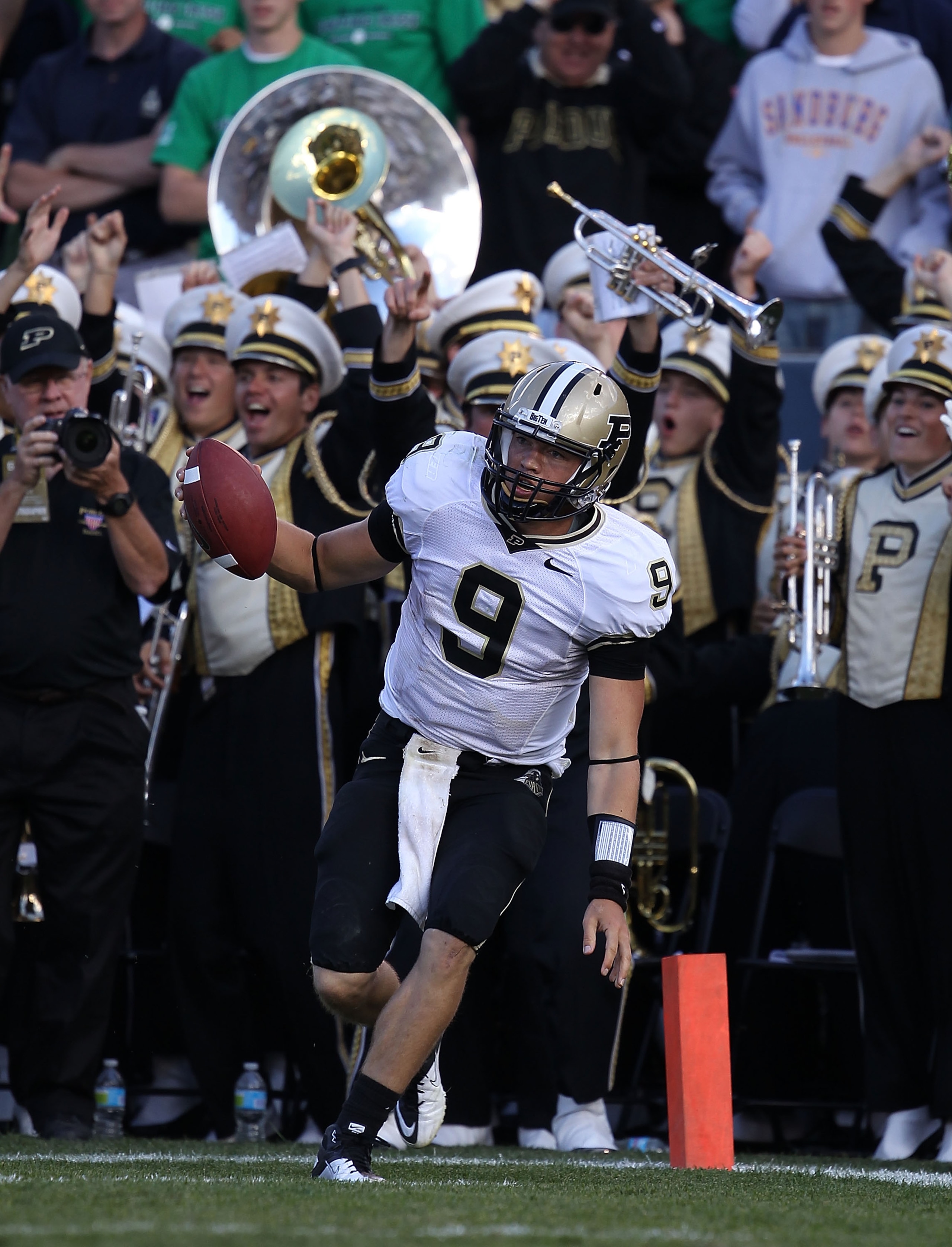 SOUTH BEND, IN - SEPTEMBER 04: Robert Marve #9 of the Purdue Boilermakers celebrates in the end zone after scoring a touchdown against the Notre Dame Fighting Irish at Notre Dame Stadium on September 4, 2010 in South Bend, Indiana. Notre Dame defated Purd