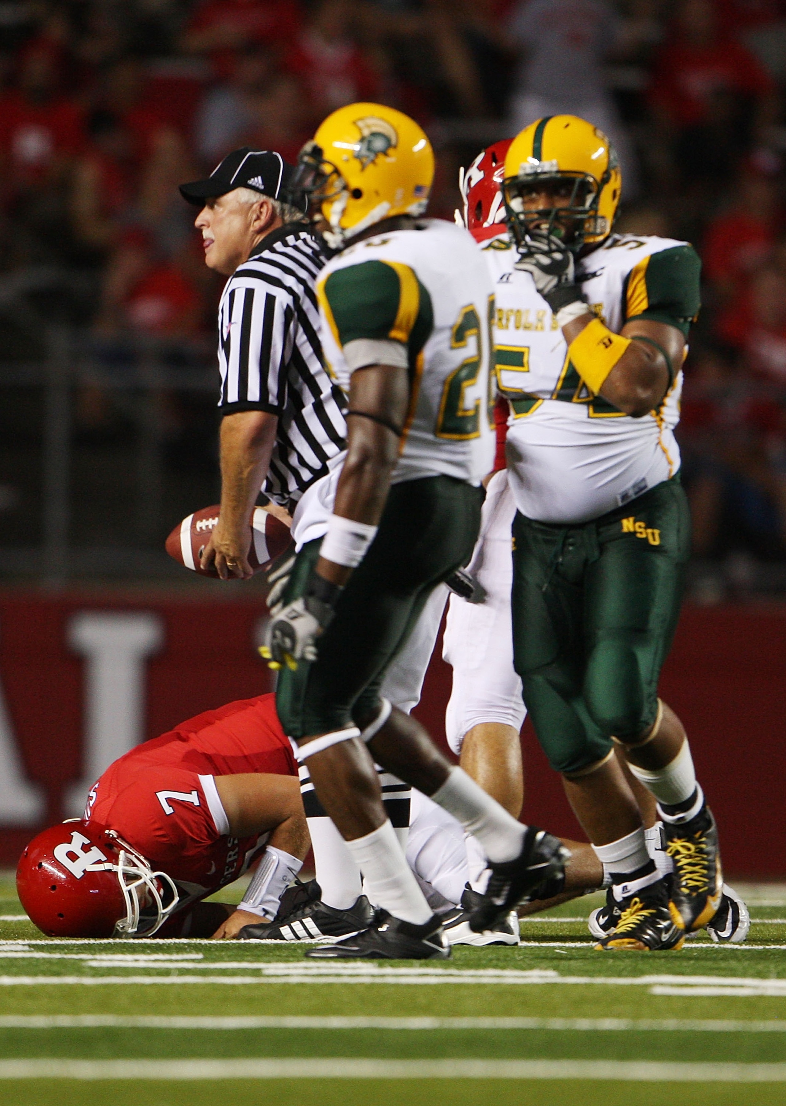 NEW BRUNSWICK, NJ - SEPTEMBER 02:  Tom Savage #7 of the Rutgers Scarlet Knights took a few moments to get up after a tackle in the first quarter against the Norfolk State Spartans at Rutgers Stadium on September 2, 2010 in New Brunswick, New Jersey.  The