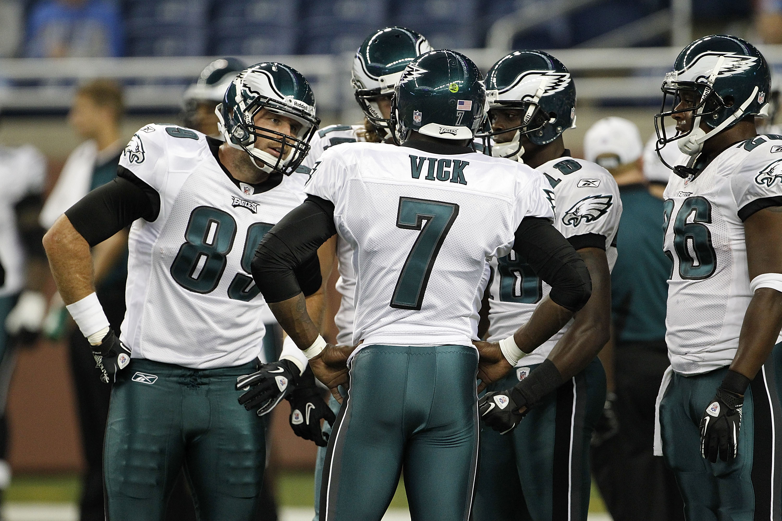 DETROIT - SEPTEMBER 19:  Michael Vick #7 of the Philadelphia Eagles calls the play in the huddle during warms up prior to the start of the game against the Detroit Lions at Ford Field on September 19, 2010 in Detroit, Michigan.  (Photo by Leon Halip/Getty