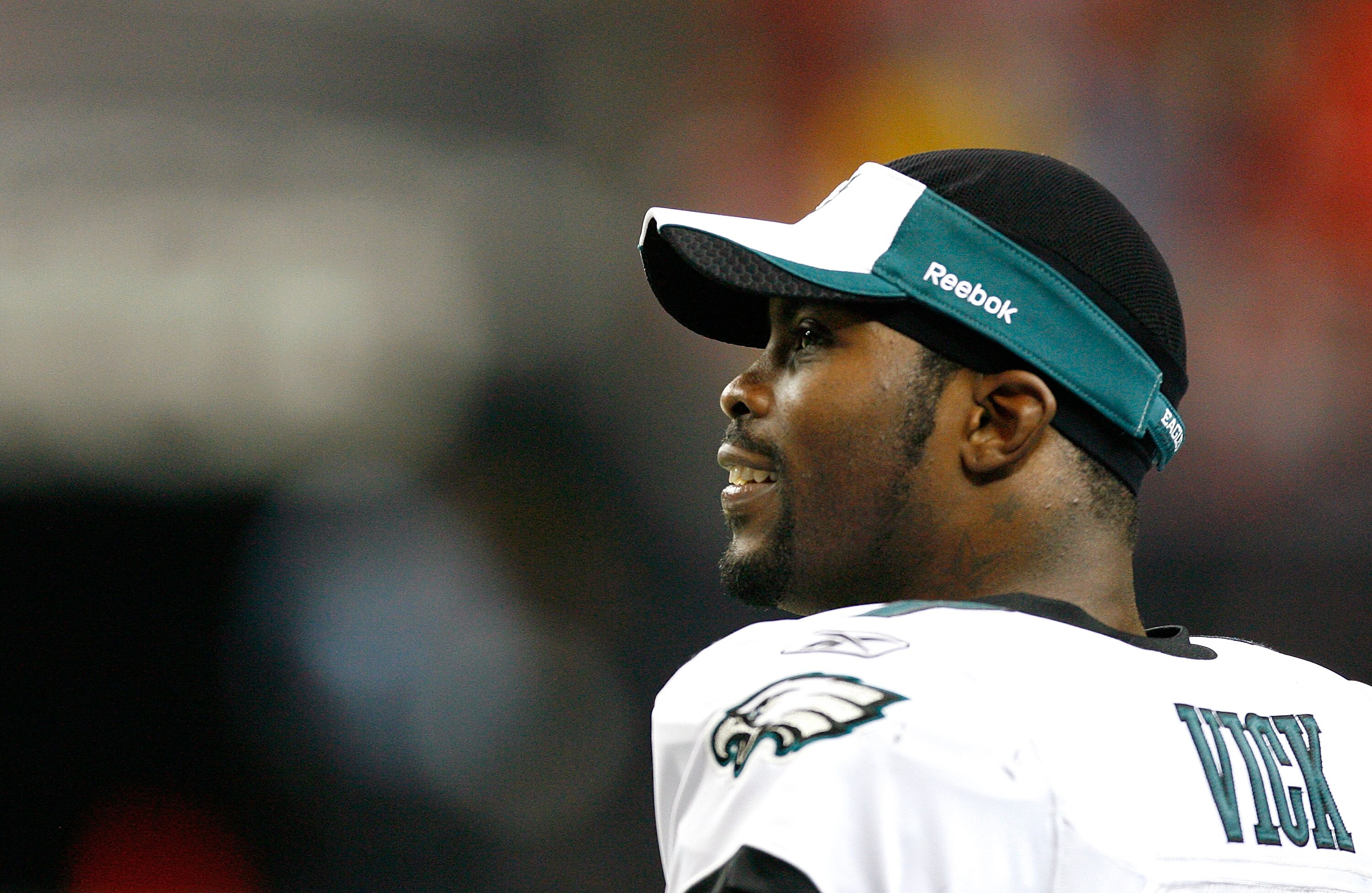 ATLANTA - DECEMBER 06:  Michael Vick #7 of the Philadelphia Eagles looks on from the sidelines during their 34-7 win over the Atlanta Falcons at Georgia Dome on December 6, 2009 in Atlanta, Georgia.  (Photo by Kevin C. Cox/Getty Images)