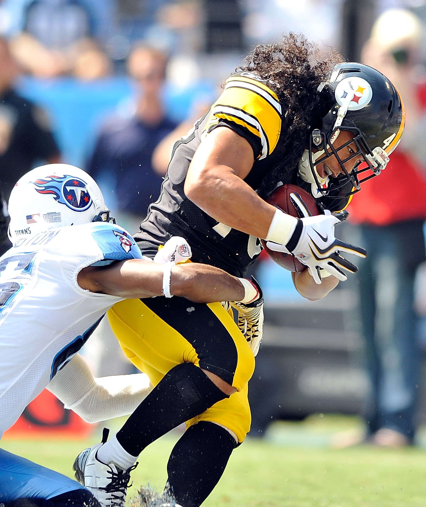 NASHVILLE, TN - SEPTEMBER 19:  Troy Polamalu #43 of the Pittsburgh Steelers intercepts a pass in the end zone intended for Nate Washington #85 of the Tennessee Titans  during the first half at LP Field on September 19, 2010 in Nashville, Tennessee.  (Phot