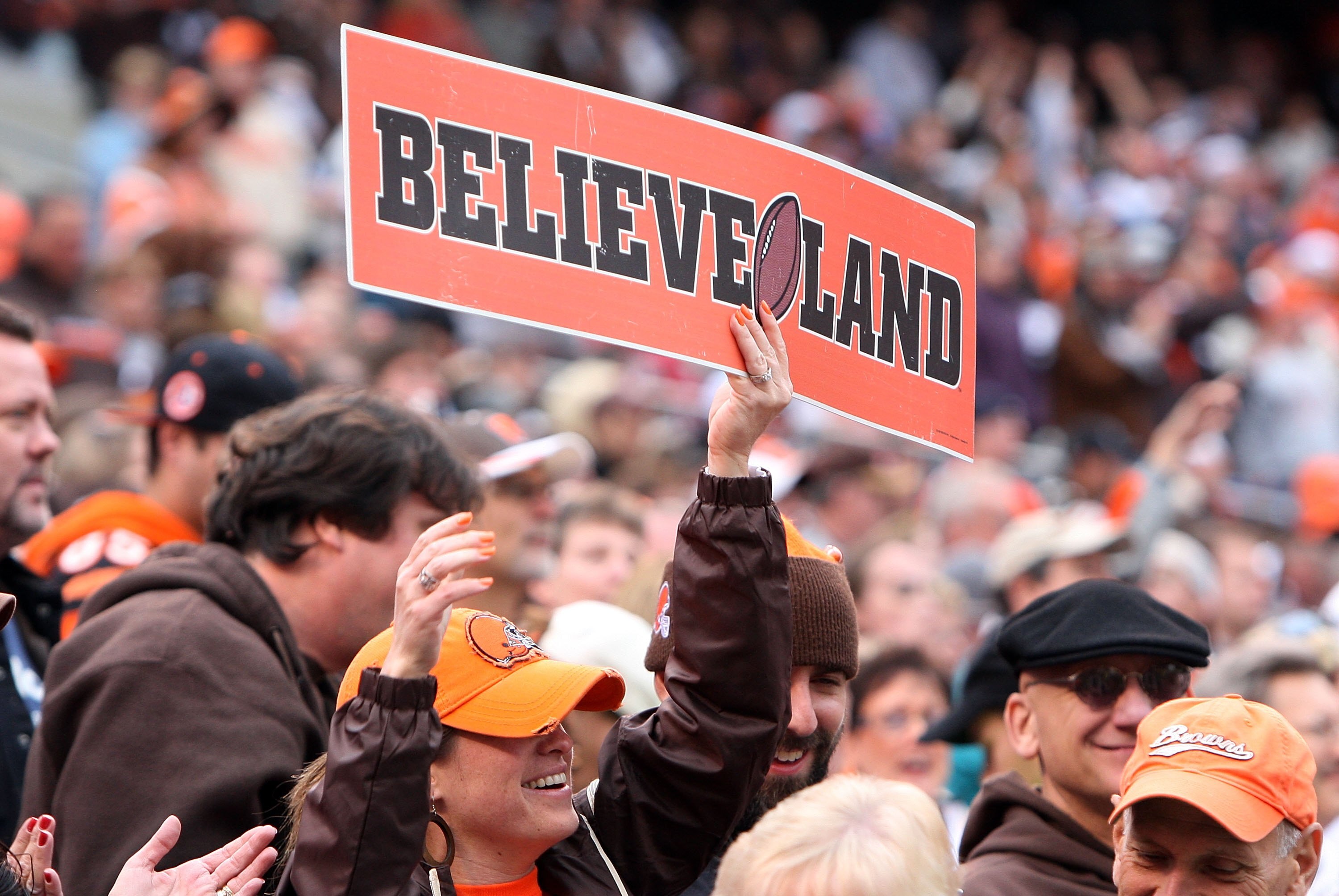 CLEVELAND - OCTOBER 04:  A fan of the Cleveland Browns cheers on his team as they play the Cincinnati Bengals at Cleveland Browns Stadium on October 4, 2009 in Cleveland, Ohio.  (Photo by Jim McIsaac/Getty Images)