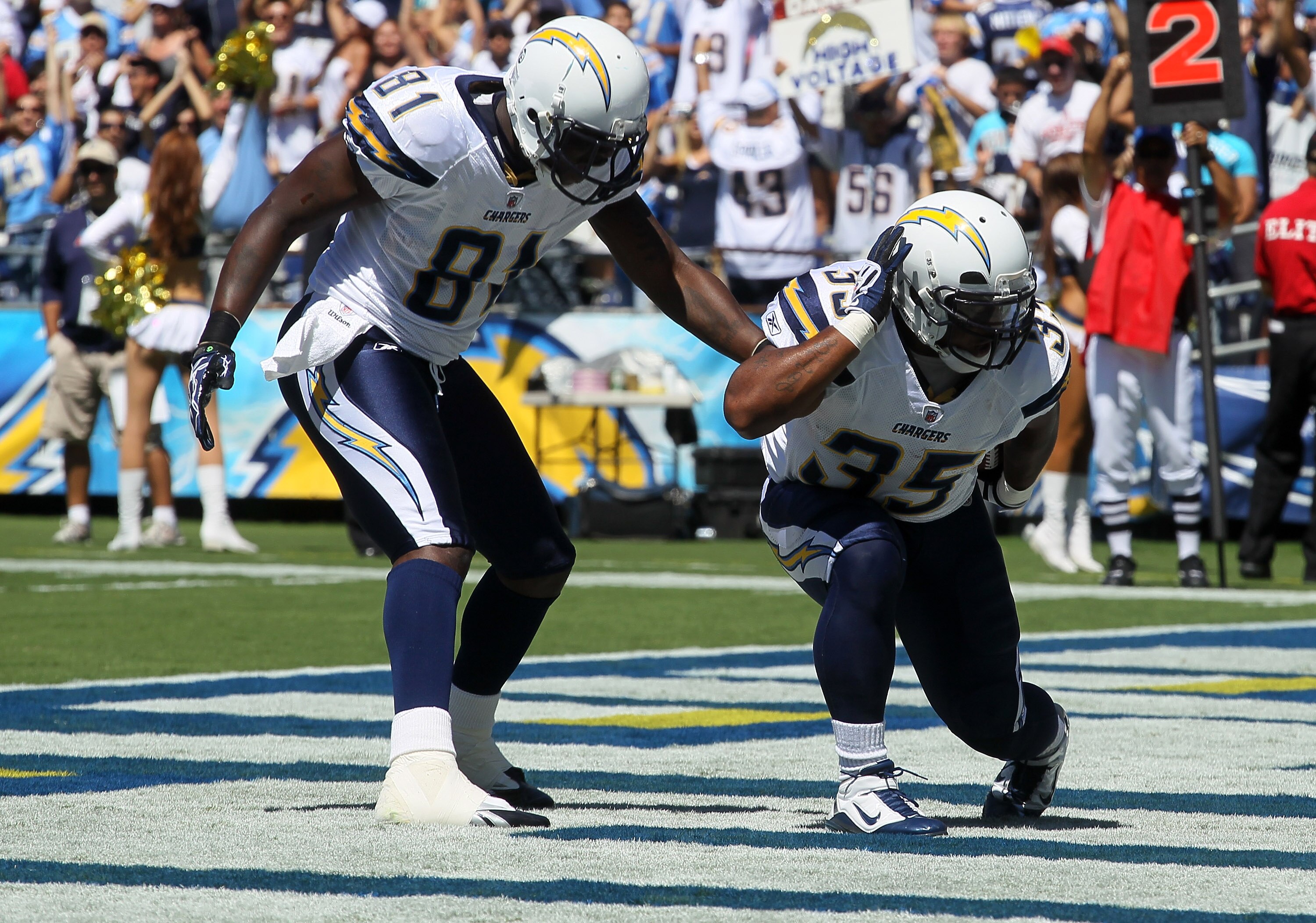 SAN DIEGO - SEPTEMBER 19:  Running back Mike Tolbert #35 and tight end Randy McMichael #81 of the San Diego Chargers celebrate Tolbert's first quarter touchdown run against the Jacksonville Jaguars at Qualcomm Stadium on lbSeptember 19, 2010 in San Diego,
