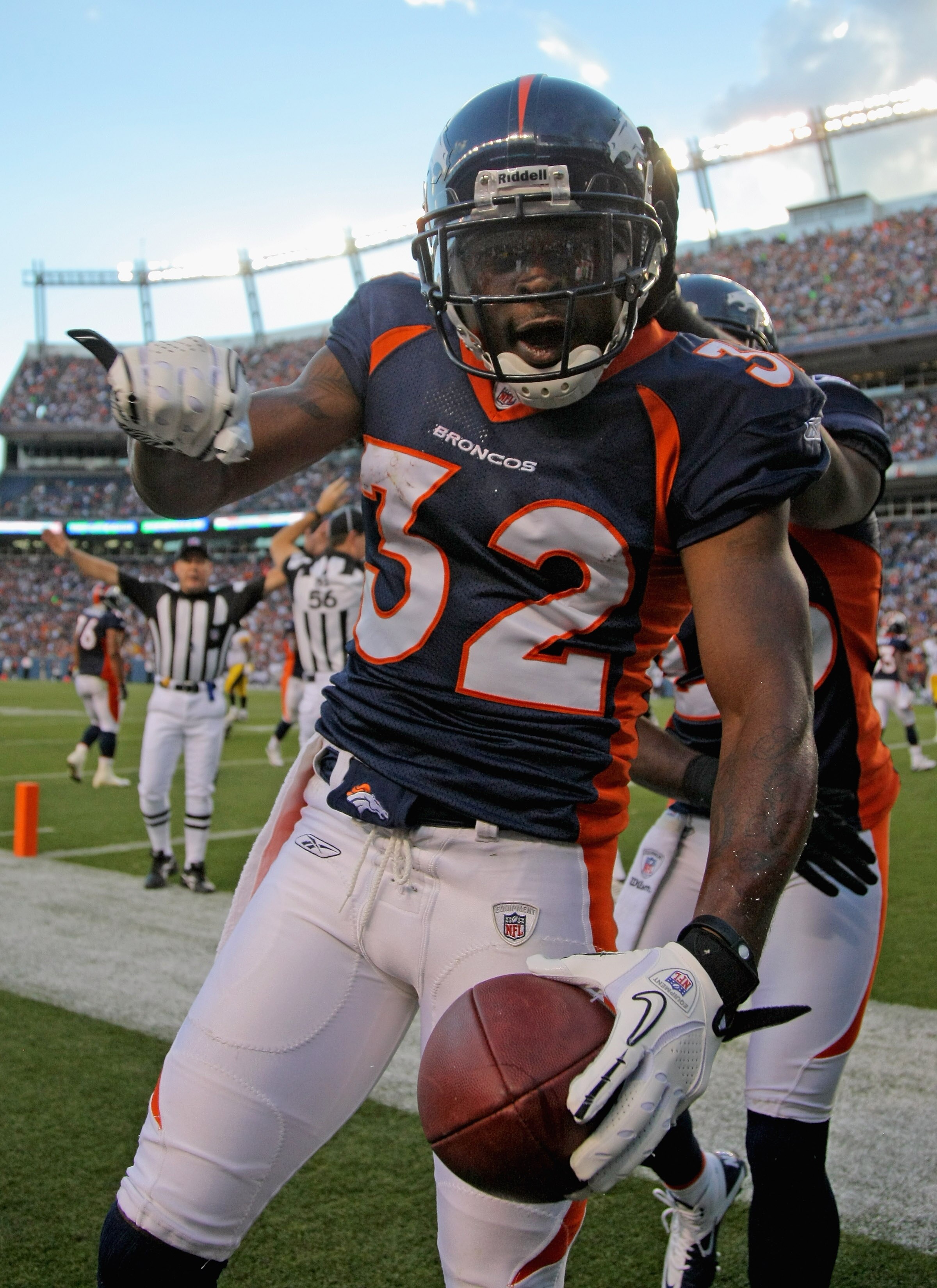 DENVER - AUGUST 29:  Cornerback Perrish Cox #32 of the Denver Broncos celebrates his interception of a pass by quarterback Dennis Dixon of the Pittsburgh Steelers in the endzone during preseason NFL action at INVESCO Field at Mile High on August 29, 2010