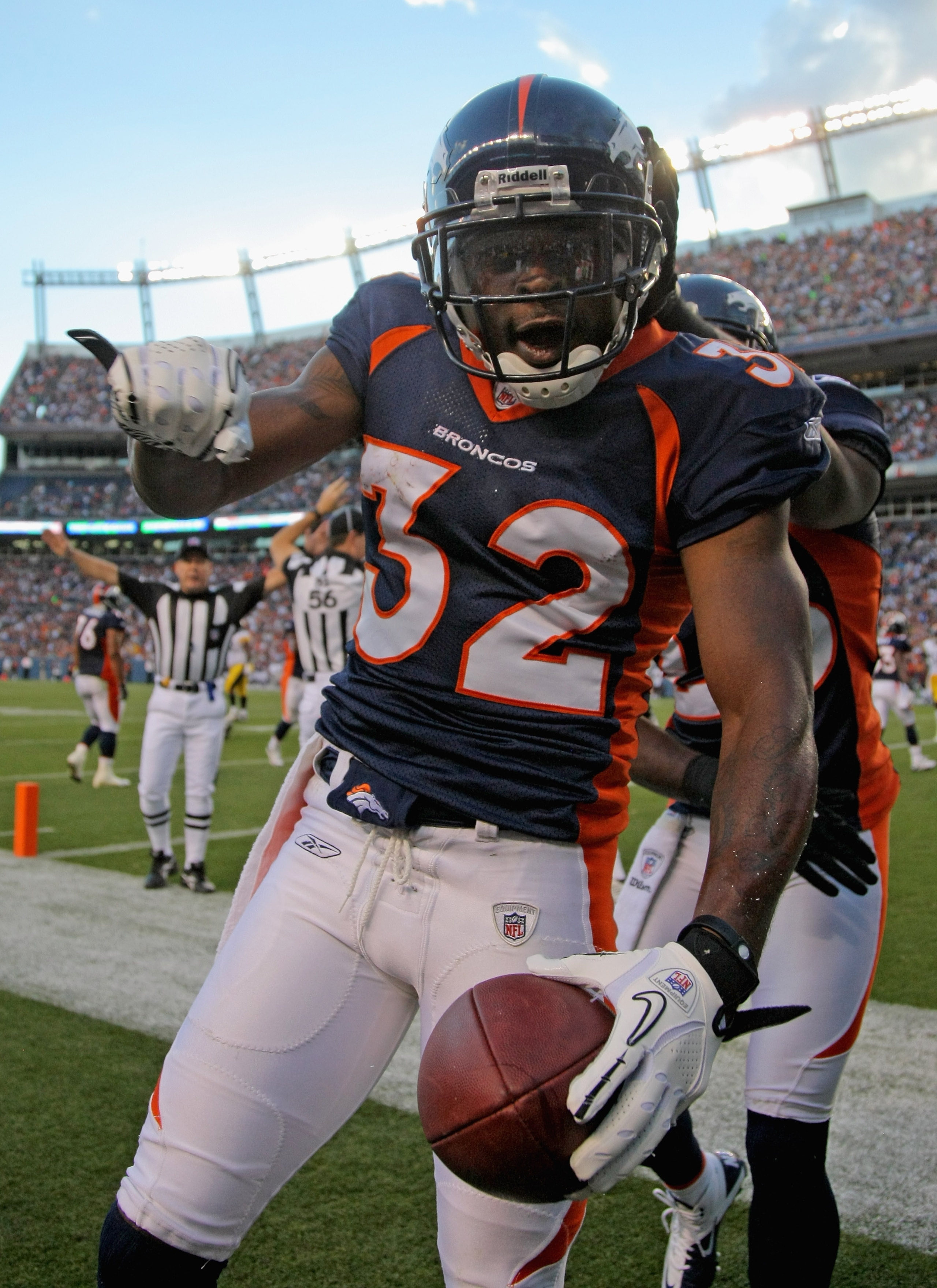 DENVER - AUGUST 29: Cornerback Perrish Cox #32 of the Denver Broncos celebrates his interception of a pass by quarterback Dennis Dixon of the Pittsburgh Steelers in the endzone during preseason NFL action at INVESCO Field at Mile High on August 29, 2010 DENVER - AUGUST 29: Cornerback Perrish Cox #32 of the Denver Broncos celebrates his interception of a pass by quarterback Dennis Dixon of the Pittsburgh Steelers in the endzone during preseason NFL action at INVESCO Field at Mile High on August 29, 2010