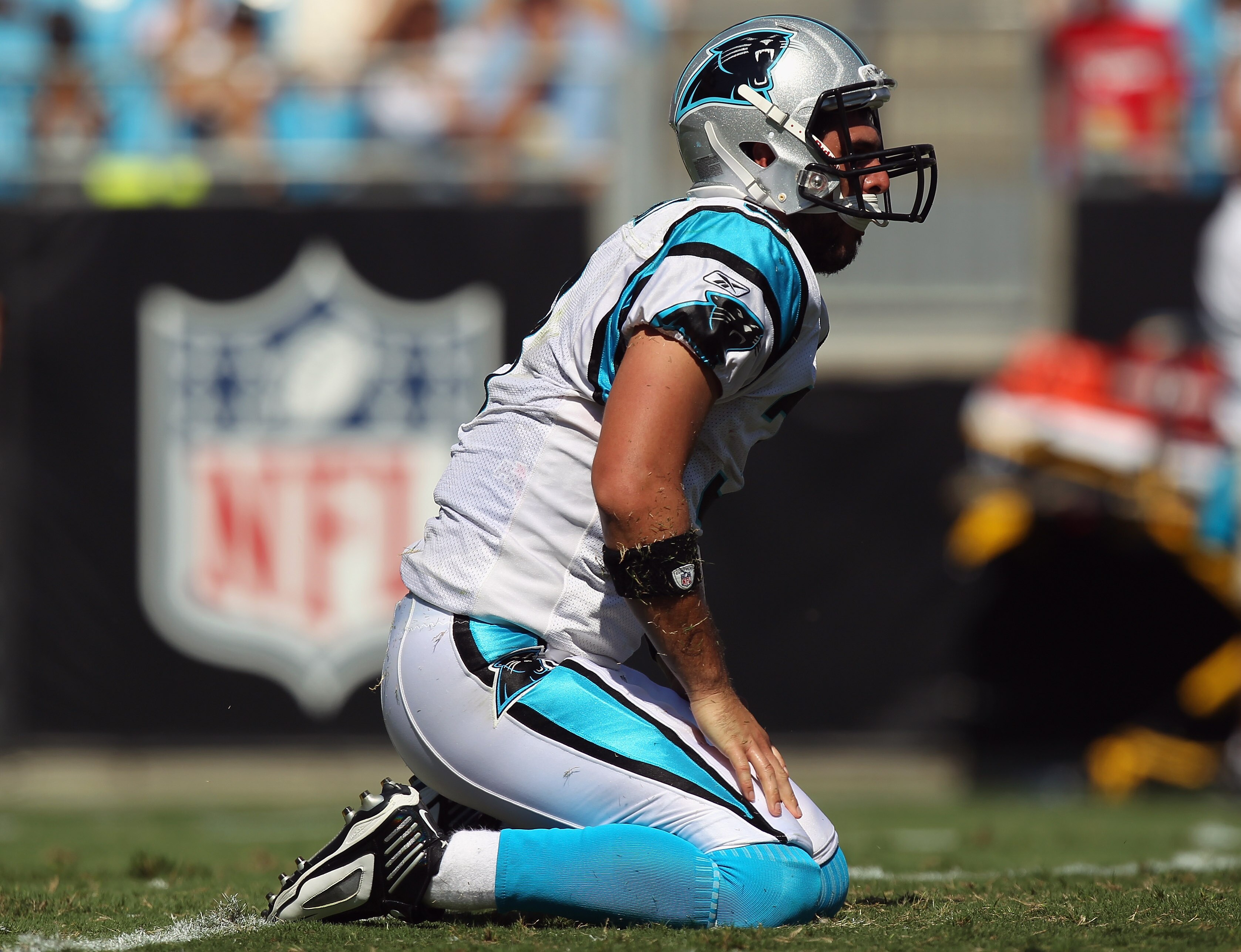 CHARLOTTE, NC - SEPTEMBER 19:  Matt Moore #3 of the Carolina Panthers gets up after being hit hard in the second half during their game against the Tampa Bay Buccaneers at Bank of America Stadium on September 19, 2010 in Charlotte, North Carolina.  (Photo