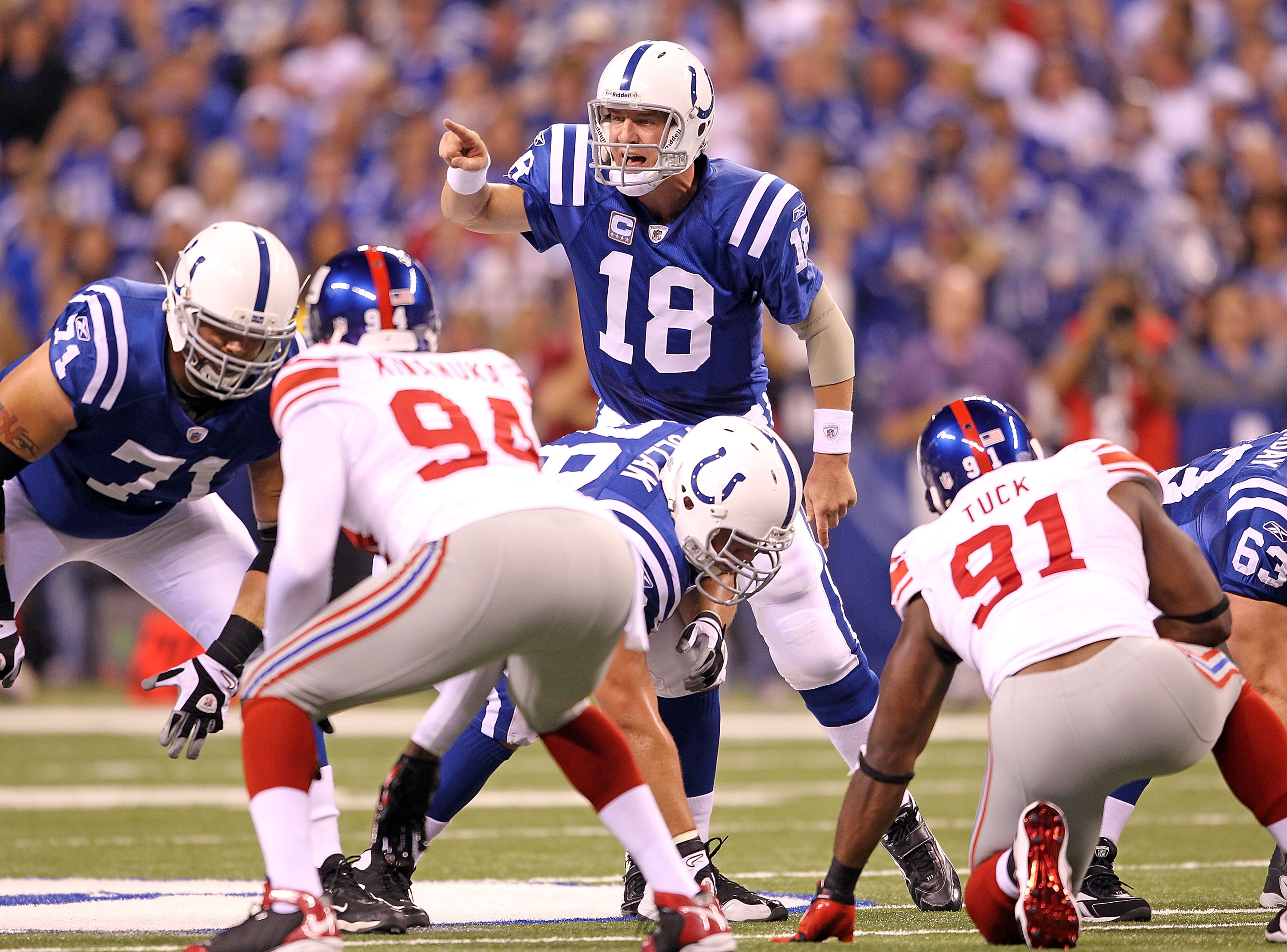 INDIANAPOLIS - SEPTEMBER 19:  Peyton Manning #18 of the Indianapolis Colts gives instructions to his team during  the NFL game against the New York Giants  at Lucas Oil Stadium on September 19, 2010 in Indianapolis, Indiana.  (Photo by Andy Lyons/Getty Im