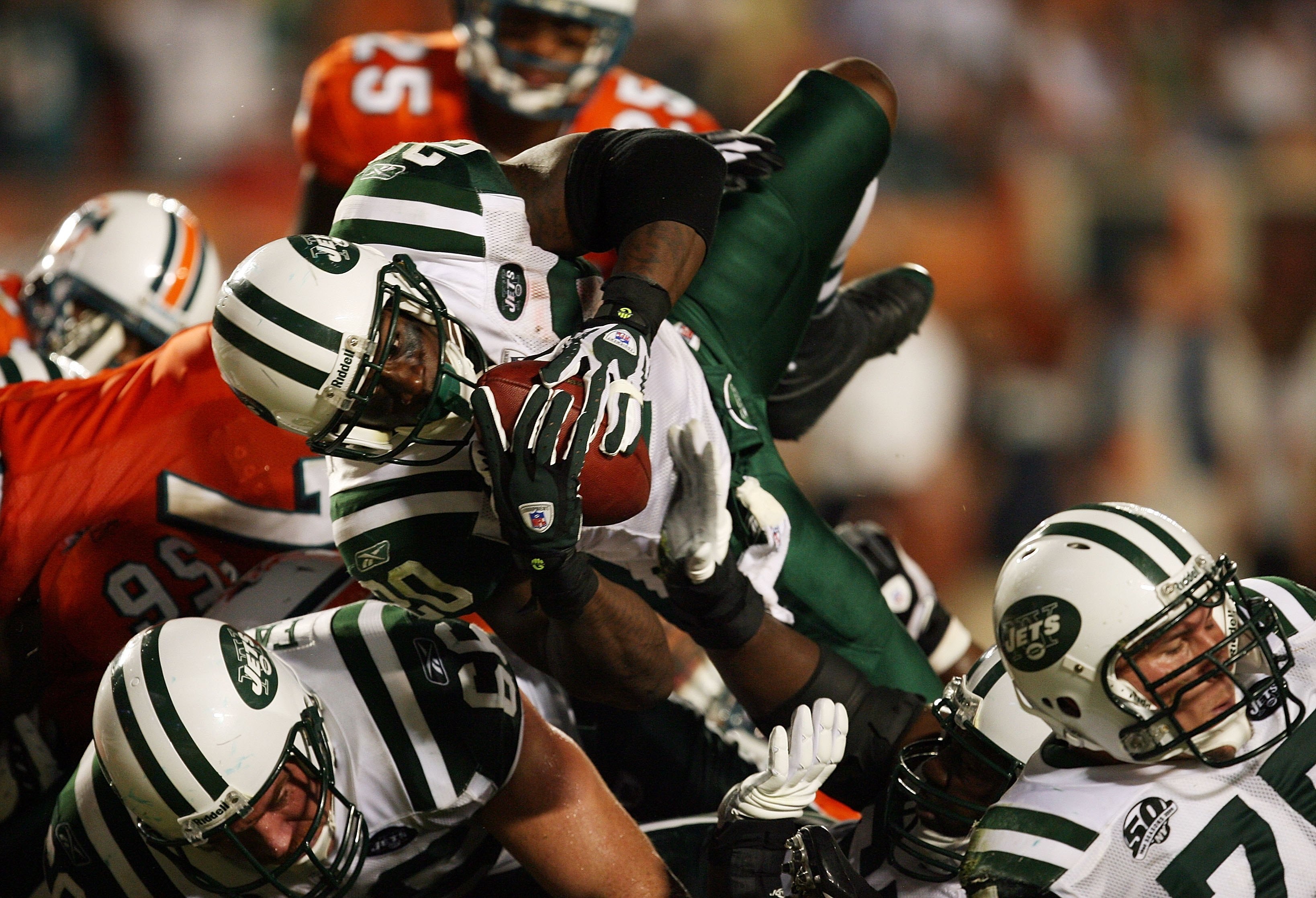 MIAMI - OCTOBER 12:  Running back Thomas Jones #20 of the New York Jets scores a touchdown against the Miami Dolphins at Land Shark Stadium on October 12, 2009 in Miami, Florida. The Dolphins defeated the Jets 31-27.  (Photo by Doug Benc/Getty Images)