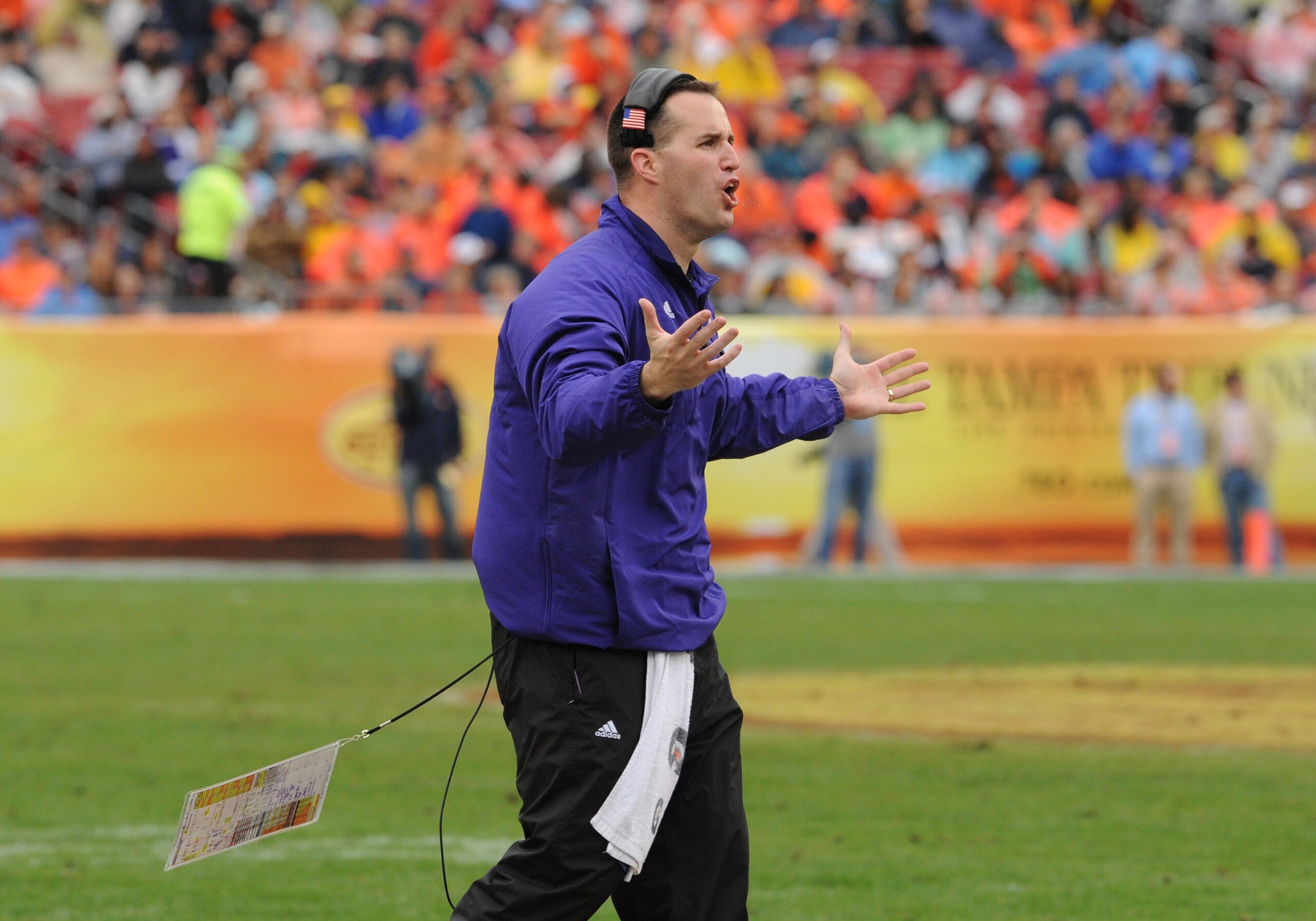TAMPA, FL - JANUARY 1: Coach Pat Fitzgerald of the Northwestern Wildcats questions a call against the Auburn Tigers in the Outback Bowl January 1, 2010 at Raymond James Stadium in Tampa, Florida.  (Photo by Al Messerschmidt/Getty Images)