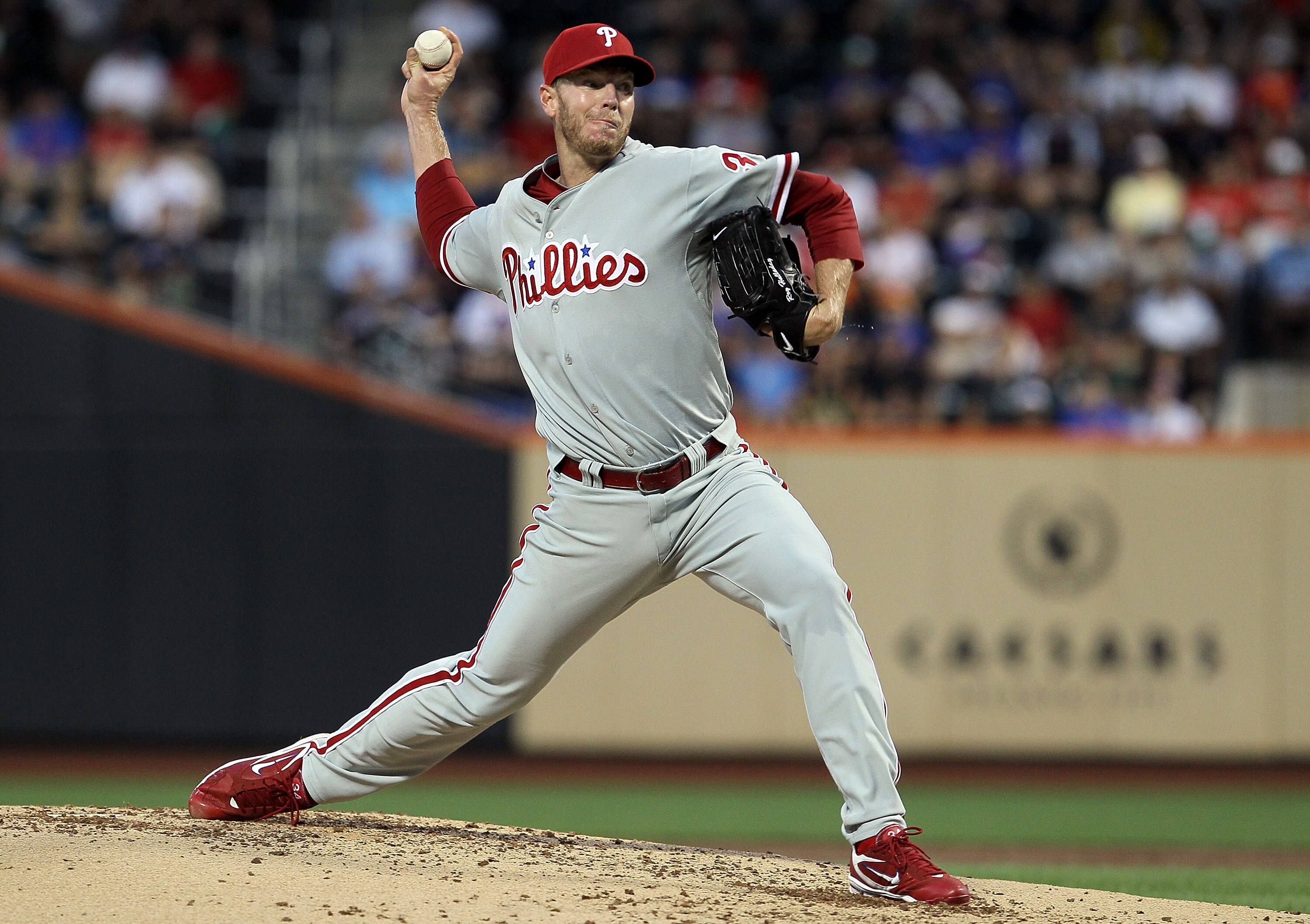 NEW YORK - AUGUST 14:  Roy Halladay #34 of the Philadelphia Phillies delivers a pitch against the New York Mets on August 14, 2010 at Citi Field in the Flushing neighborhood of the Queens borough of New York City.  (Photo by Jim McIsaac/Getty Images)
