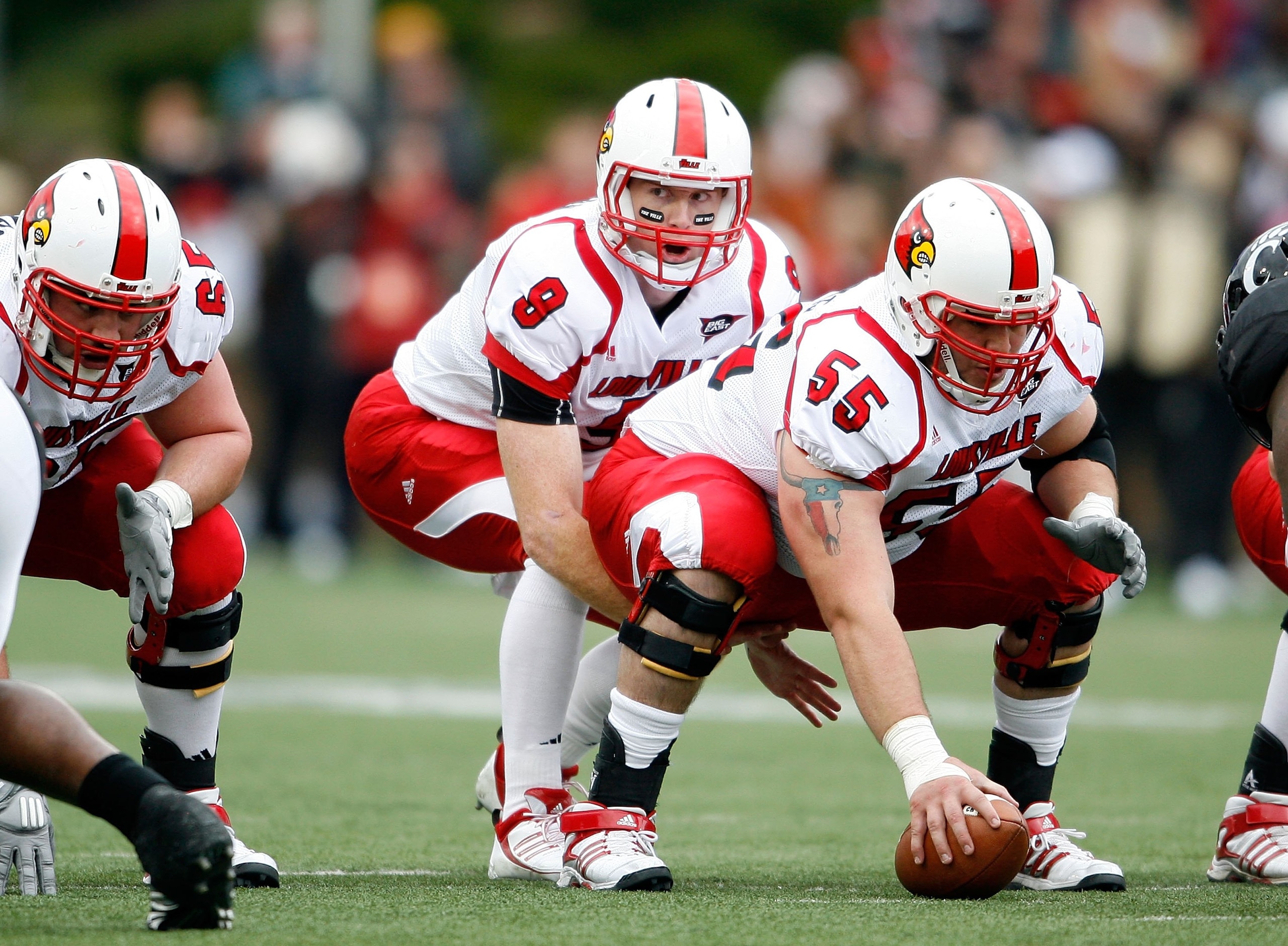 CINCINNATI - OCTOBER 24:  Adam Froman #9 of the Louisville Cardinals calls for the snap during the Big East Conference game against the Cincinnati Bearcats at Nippert Stadium on October 24, 2009 in Cincinnati, Ohio.  (Photo by Andy Lyons/Getty Images)
