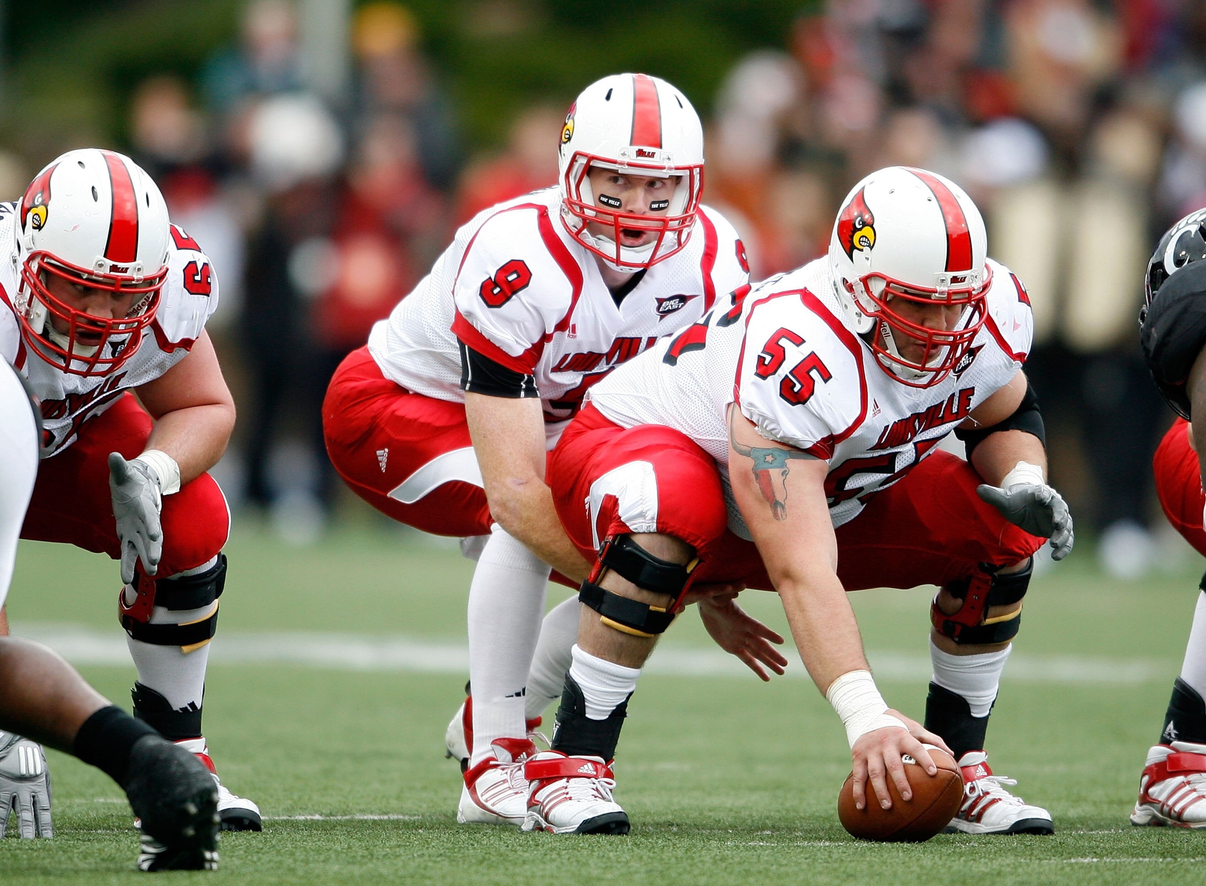 CINCINNATI - OCTOBER 24:  Adam Froman #9 of the Louisville Cardinals calls for the snap during the Big East Conference game against the Cincinnati Bearcats at Nippert Stadium on October 24, 2009 in Cincinnati, Ohio.  (Photo by Andy Lyons/Getty Images)