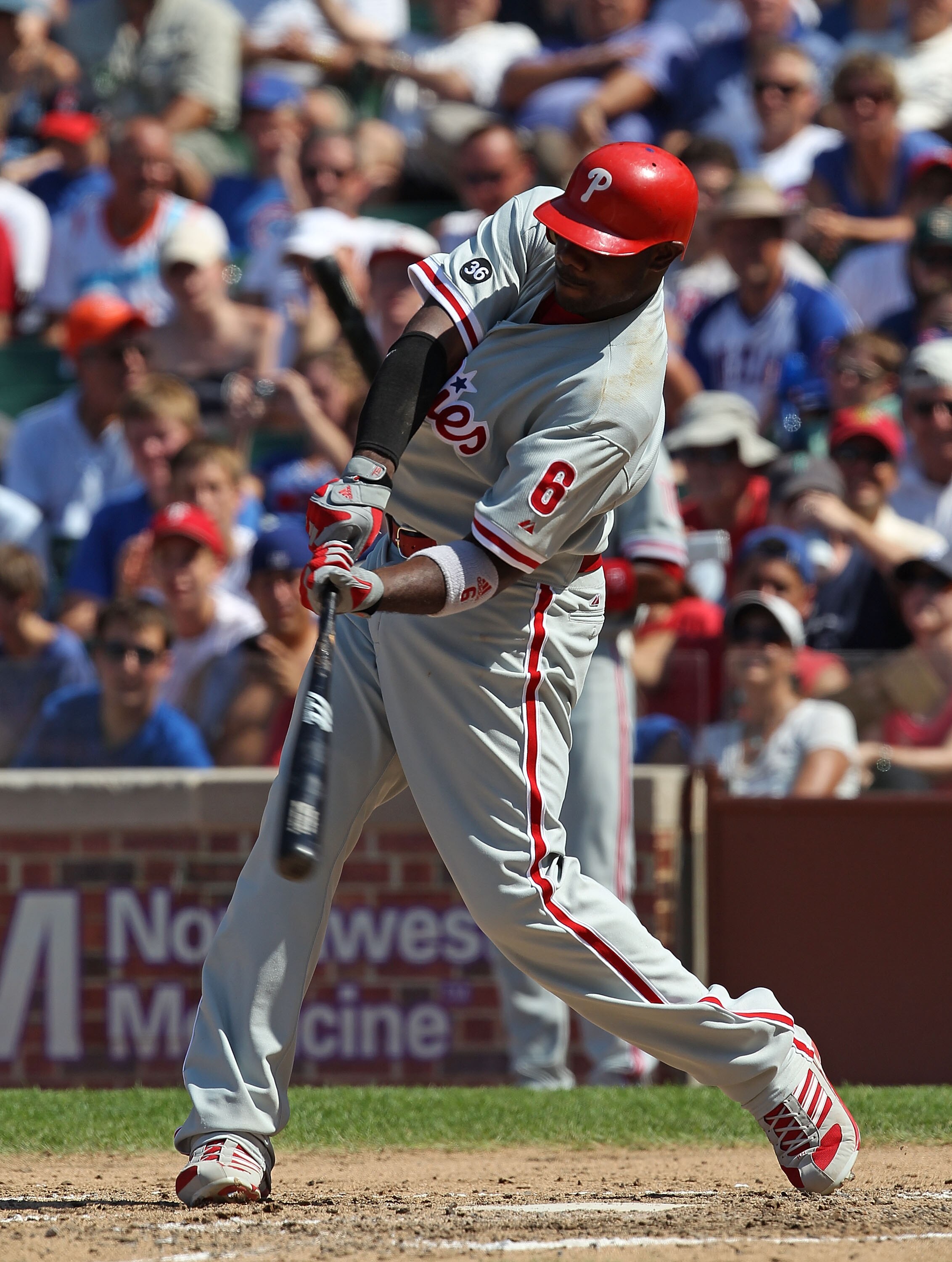 CHICAGO - JULY 16: Ryan Howard #6 of the Philadelphia Phillies takes a swing against the Chicago Cubs at Wrigley Field on July 16, 2010 in Chicago, Illinois. The Cubs defeated the Phillies 4-3. (Photo by Jonathan Daniel/Getty Images)