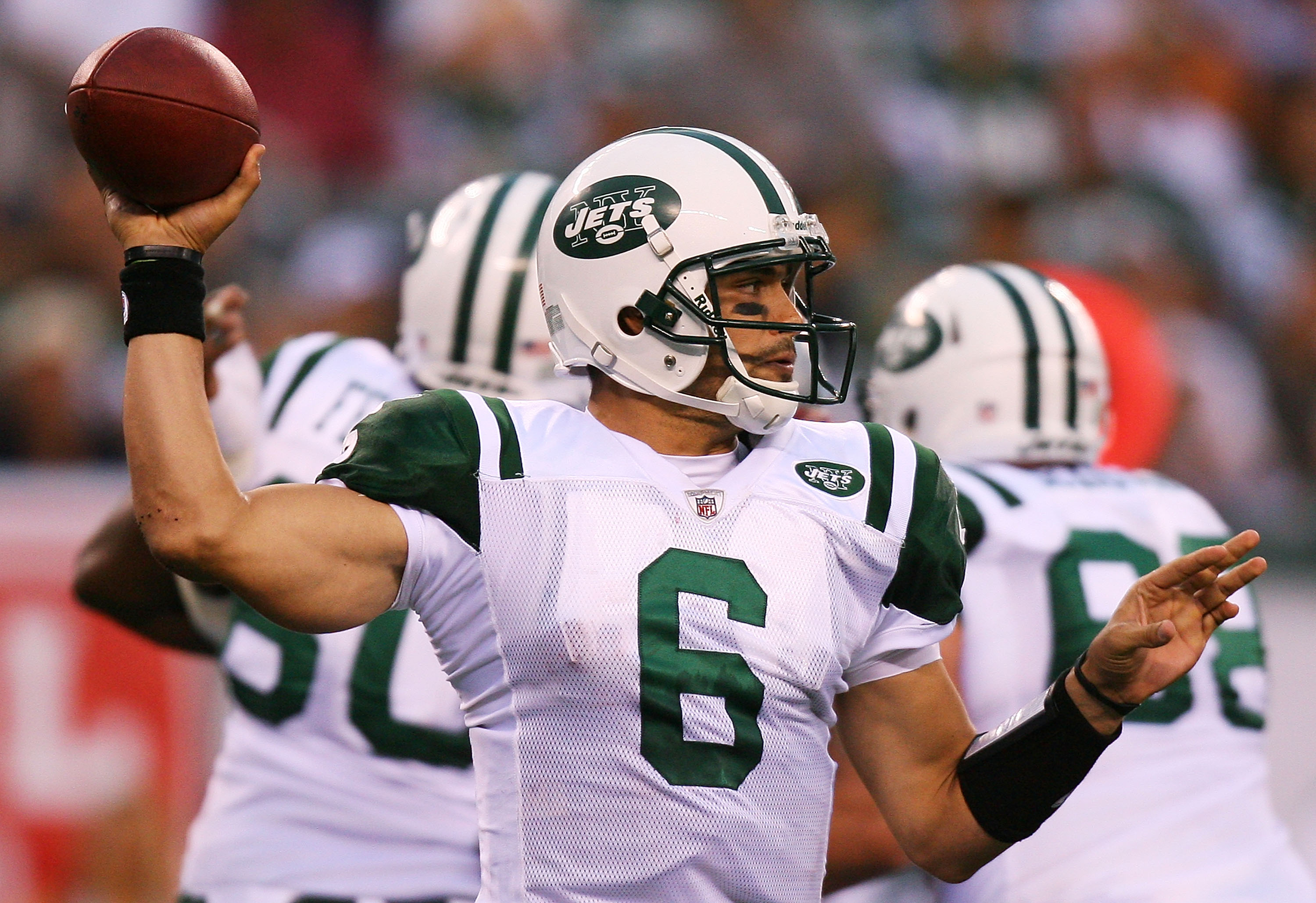 EAST RUTHERFORD, NJ - SEPTEMBER 19:  Mark Sanchez #6 of the New York Jets drops back against the New England Patriots at the New Meadowlands Stadium on September 19, 2010 in East Rutherford, New Jersey. The Jets defeated the Patriots 28 - 14.  (Photo by A
