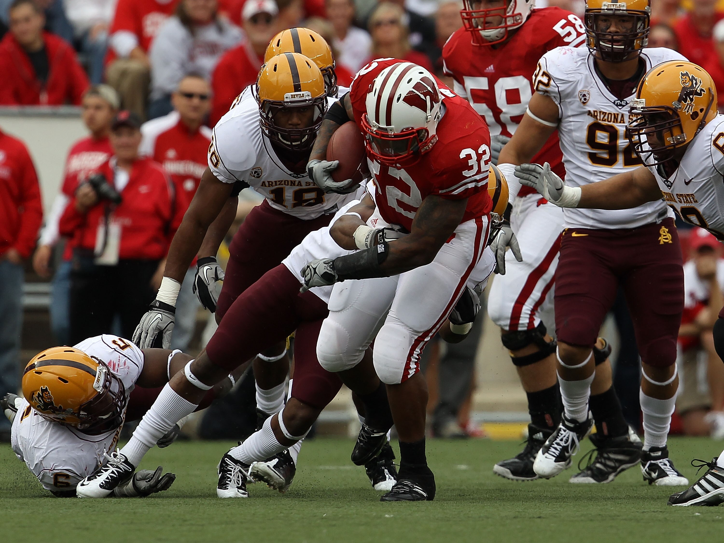 MADISON, WI - SEPTEMBER 18: John Clay #32 of the Wisconsin Badgers runs for yardage against the Arizona State Sun Devils at Camp Randall Stadium on September 18, 2010 in Madison, Wisconsin. Wisconsin defeated Arizona State 20-19. (Photo by Jonathan Daniel