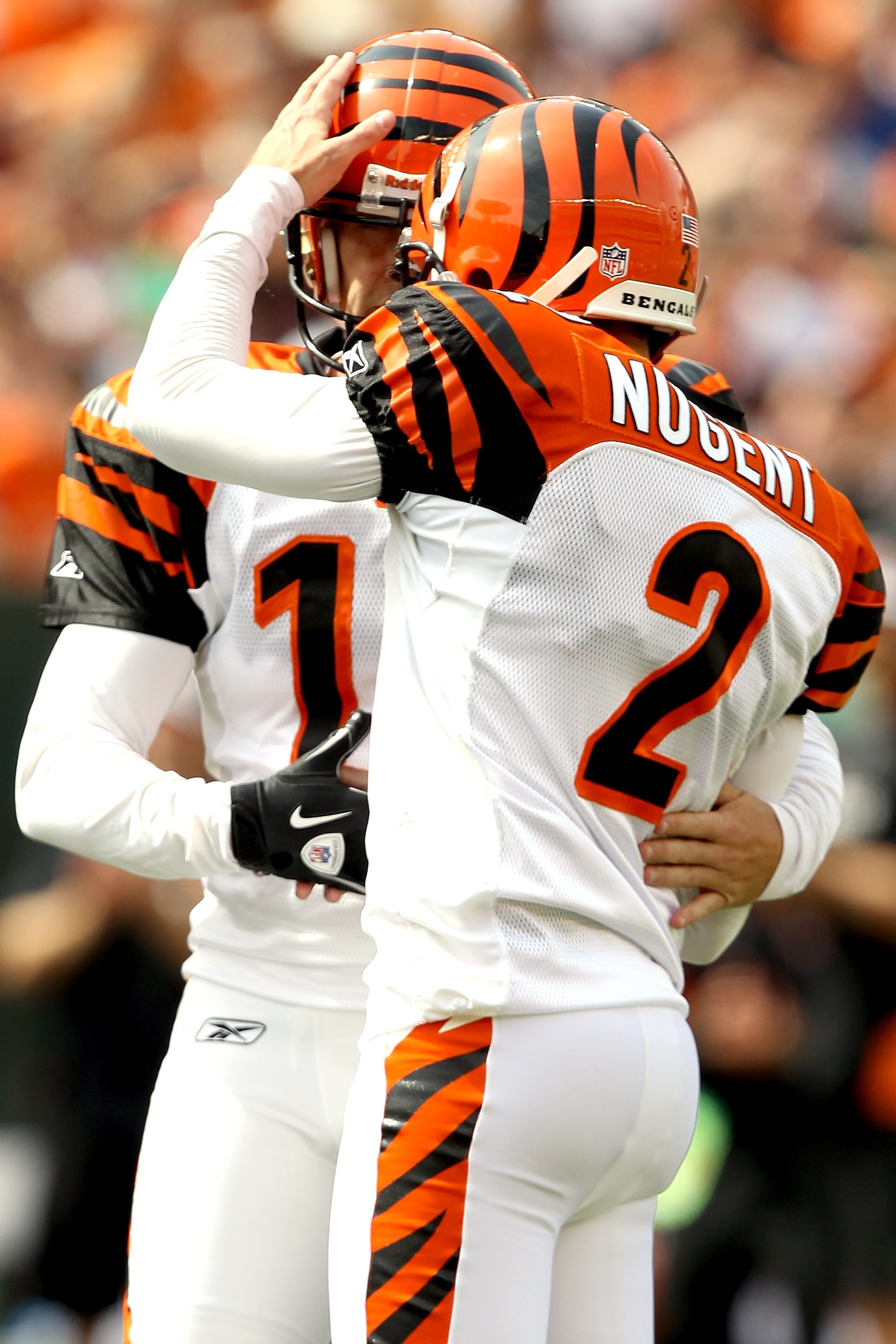 CINCINNATI - SEPTEMBER 19:  Holder Kevin Huber #10 of the Cincinatti Bengals congratulates Mike Nugent #2 after his field goal against the Baltimore ravens at Paul Brown Stadium on September 19, 2010 in Cincinnati, Ohio. (Photo by Matthew Stockman/Getty I