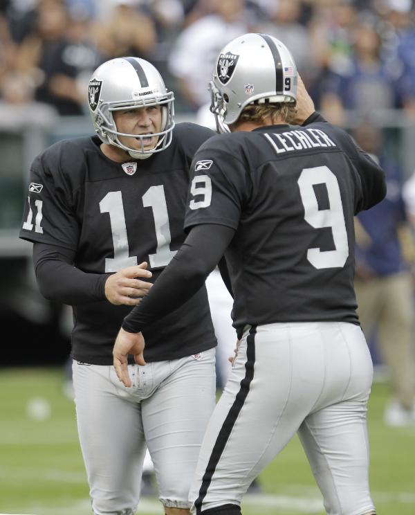 Janikowski and Lechler celebrate what proved to be the game winning kick.