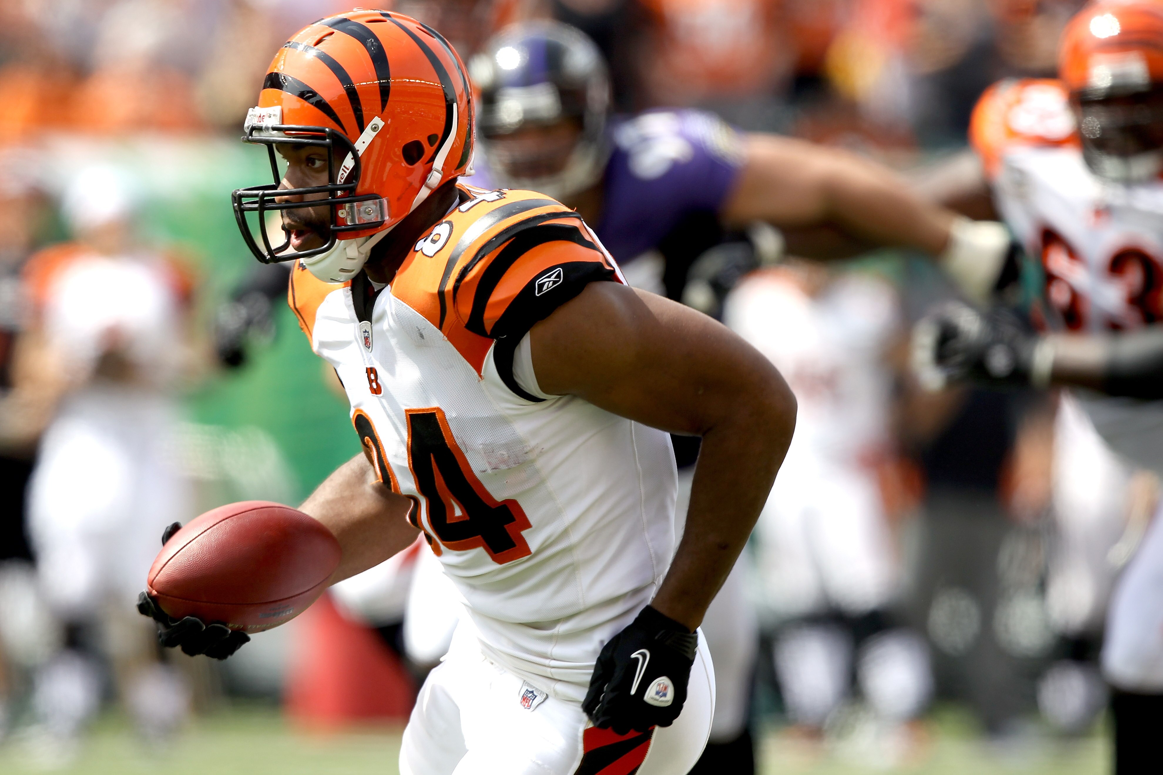 CINCINNATI - SEPTEMBER 19:  Cornerback Adam Jones #24 of the Cincinnati Bengals carries the ball after intercepting a pass against the Baltimore Ravens at Paul Brown Stadium on September 19, 2010 in Cincinnati, Ohio.  (Photo by Matthew Stockman/Getty Imag
